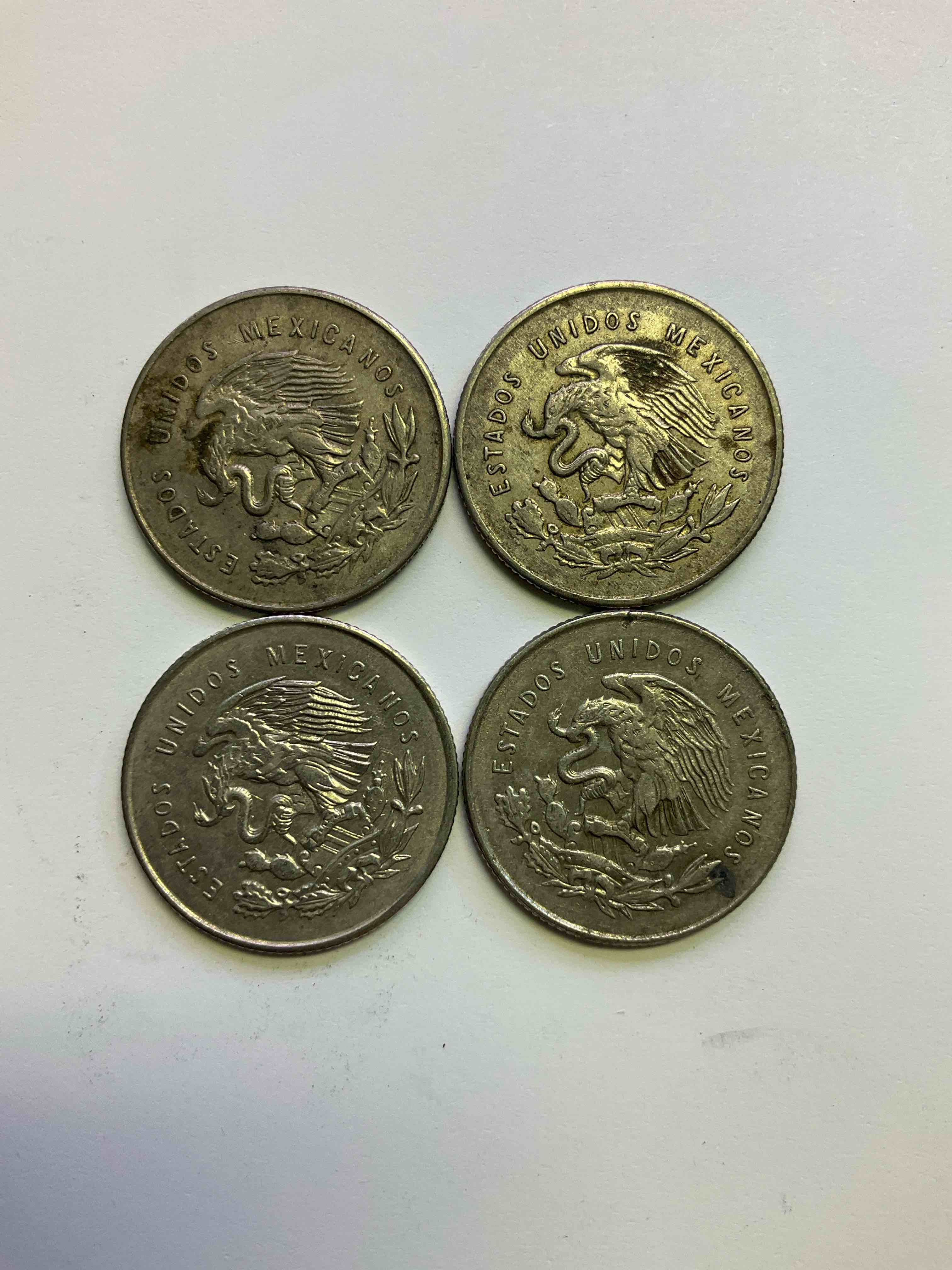 Antique Rare Mexican Silver! Lot Of Silver Antique Mexican Coins, 25 Centavos Minted In .300 (30%) Mexican Silver. Coins From The Early 1950's & Have A Really Stunning Design. These Coins Are Rarely Seen & Are Great For Collecting Rare Coins & Also For Investing In Precious Metals. You May Never See These Coins Up For Auction Again. A Great Chance To Acquire Unique Antique Mexican Silver!