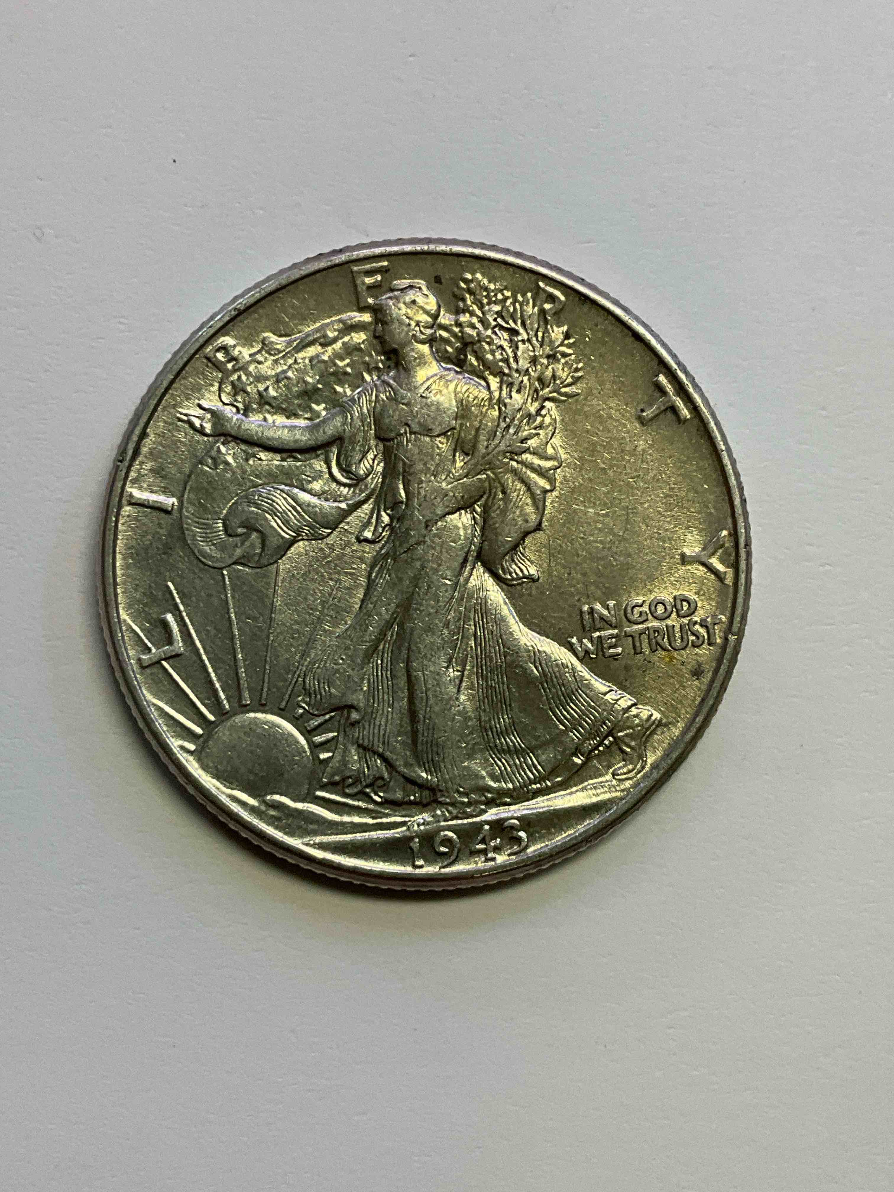 Uncirculated World War II Era Antique U.S. Silver! Liberty Walking Silver Fine U.S. Silver Half Dollar! This Striking Half Dollars Were Minted From 1916-1947 & Have Become Some Of The Most Collectible Coins In History! Here Is A Striking Uncirculated Example From 1943! Liberty Walking Coins Are 90% Fine U.S. Silver, A Great Investment In Precious Metal!