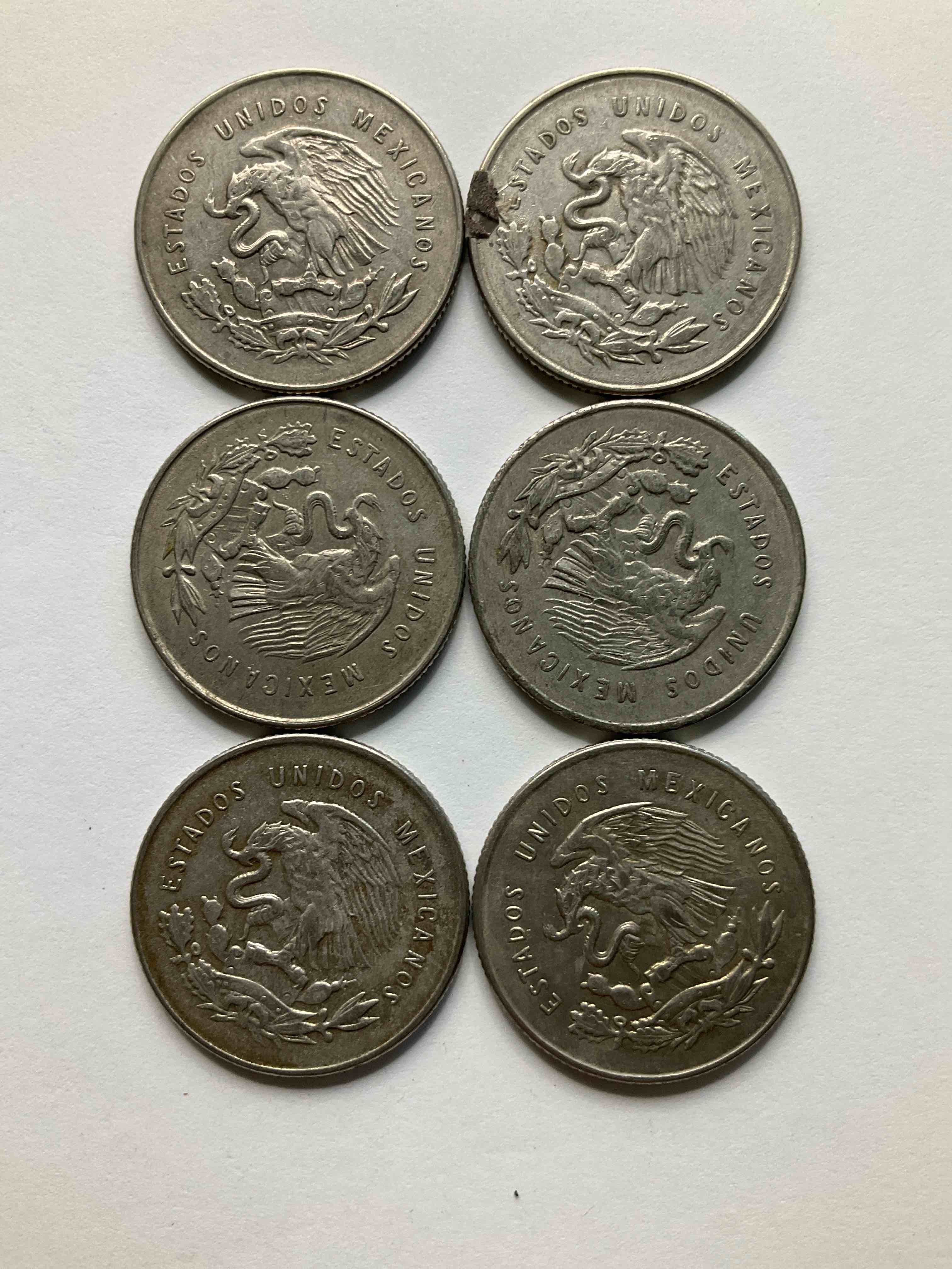 Antique Rare Mexican Silver! Lot Of Silver Antique Mexican Coins, 20 Centavos Minted In .300 (30%) Mexican Silver. Coins From The Early 1950's & Have A Really Stunning Design. These Coins Are Rarely Seen & Are Great For Collecting Rare Coins & Also For Investing In Precious Metals. You May Never See These Coins Up For Auction Again. A Great Chance To Acquire Unique Antique Mexican Silver!