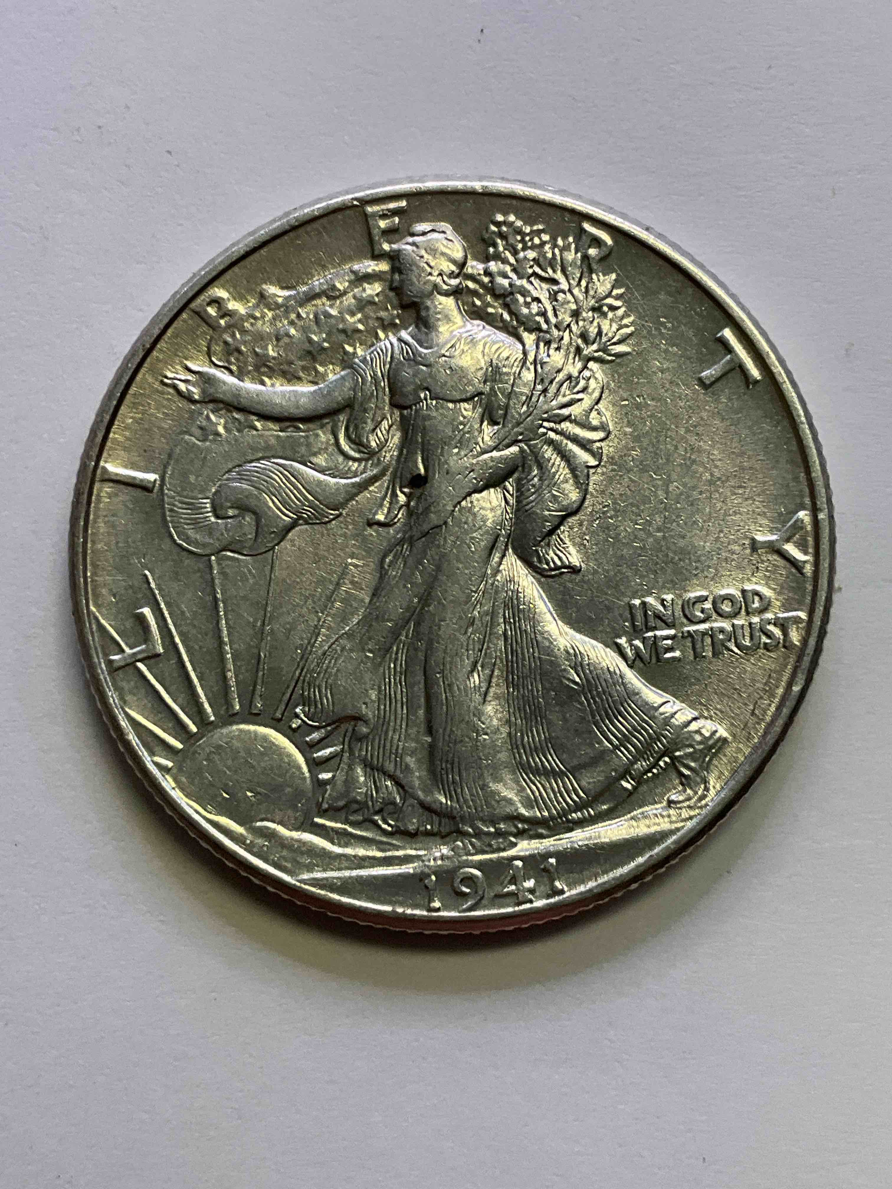 Uncirculated World War II Era Silver! Antique U.S. Silver! Liberty Walking Silver Half Dollar! This Striking Half Dollars Were Minted From 1916-1947 & Have Become Some Of The Most Collectible Coins In History! Here Is A Striking Uncirculated Example From 1941, Liberty Walking Coins Are 90% Fine U.S. Silver, A Great Investment In Precious Metal!