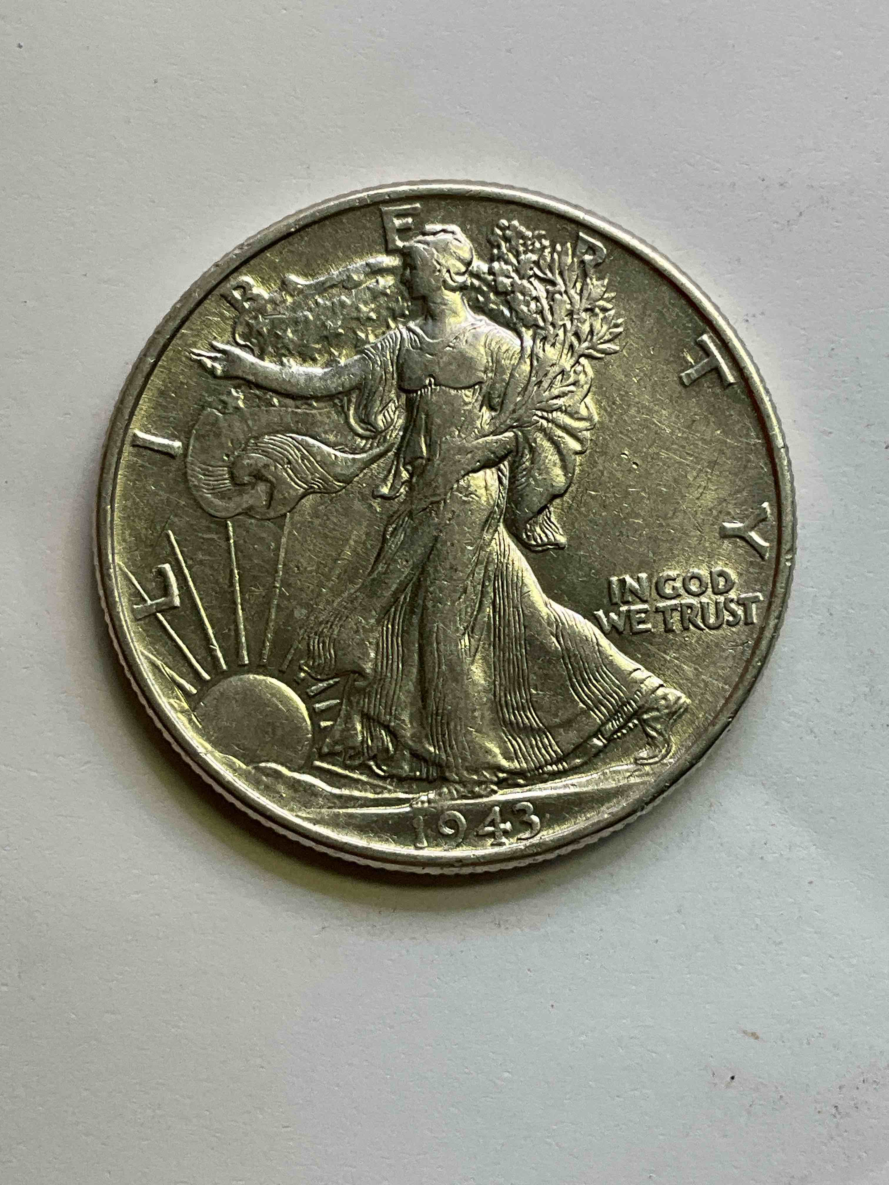 Uncirculated World War II Era Antique U.S. Silver! Liberty Walking Silver Fine U.S. Silver Half Dollar! This Striking Half Dollars Were Minted From 1916-1947 & Have Become Some Of The Most Collectible Coins In History! Here Is A Striking Uncirculated Example From 1943! Liberty Walking Coins Are 90% Fine U.S. Silver, A Great Investment In Precious Metal!