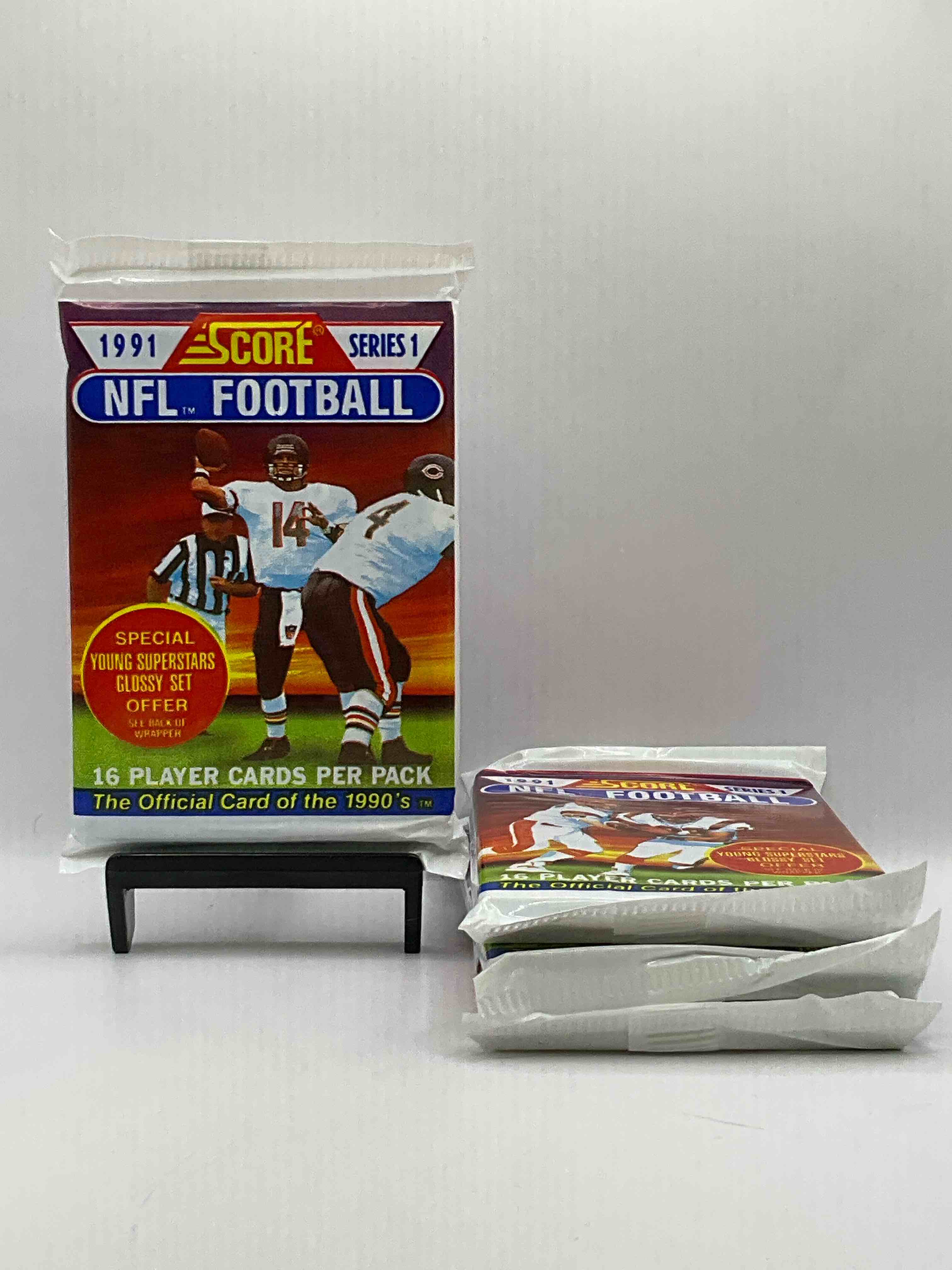 1991 NFL Score Football Sealed Card Pack, Direct From Original Retail Case! These Cards Are Sought After By Collectors For Their Awesome, Nostalgic Look. Search For Brett Favre Rookie, Early Jerry Rice, Early Emmit Smith, Joe Montana & So Much More!