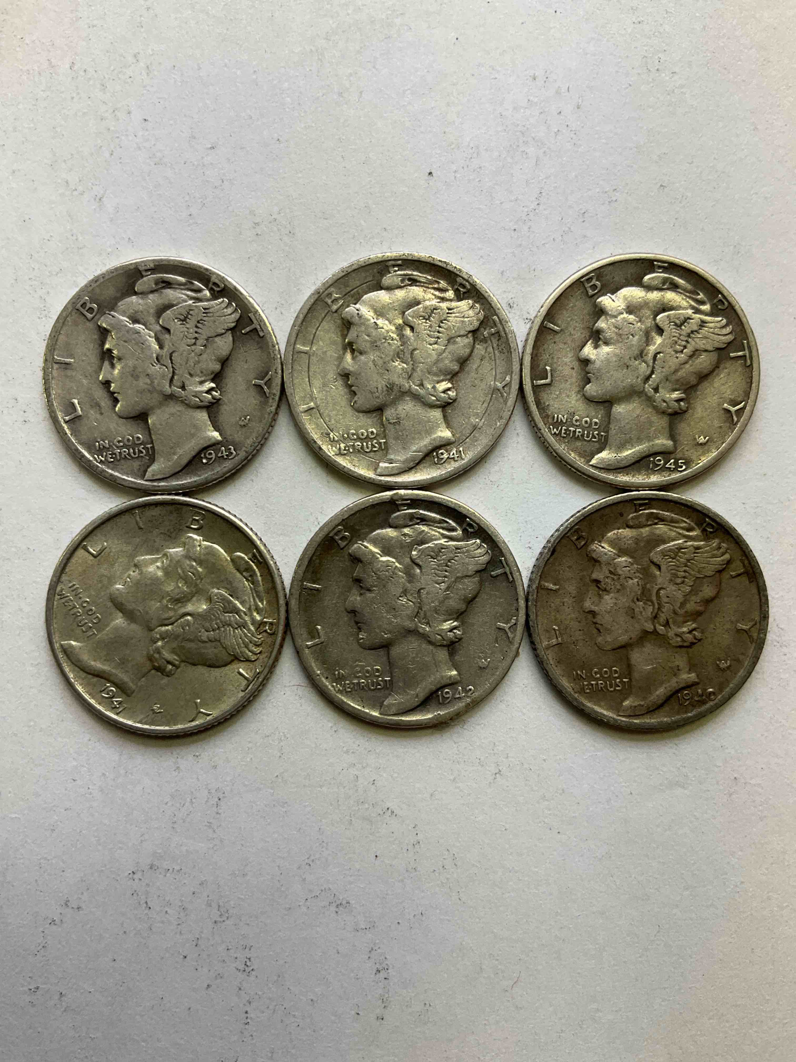 Antique U.S. Pure Fine Silver Mercury Dimes! Silver Mercury Dimes Were Minted From 1916-1945 & Have Become Serious Collector Items! Check Out These Awesome Examples, All In Nice, Circulated Condition With Visible Dates & Varying Years! Rare To Have Visible Dates! Makes For A Great Investment In Precious Metals, Mercury Dimes Are 90% Pure Fine Silver! They Don't Make Em' Like This Anymore!