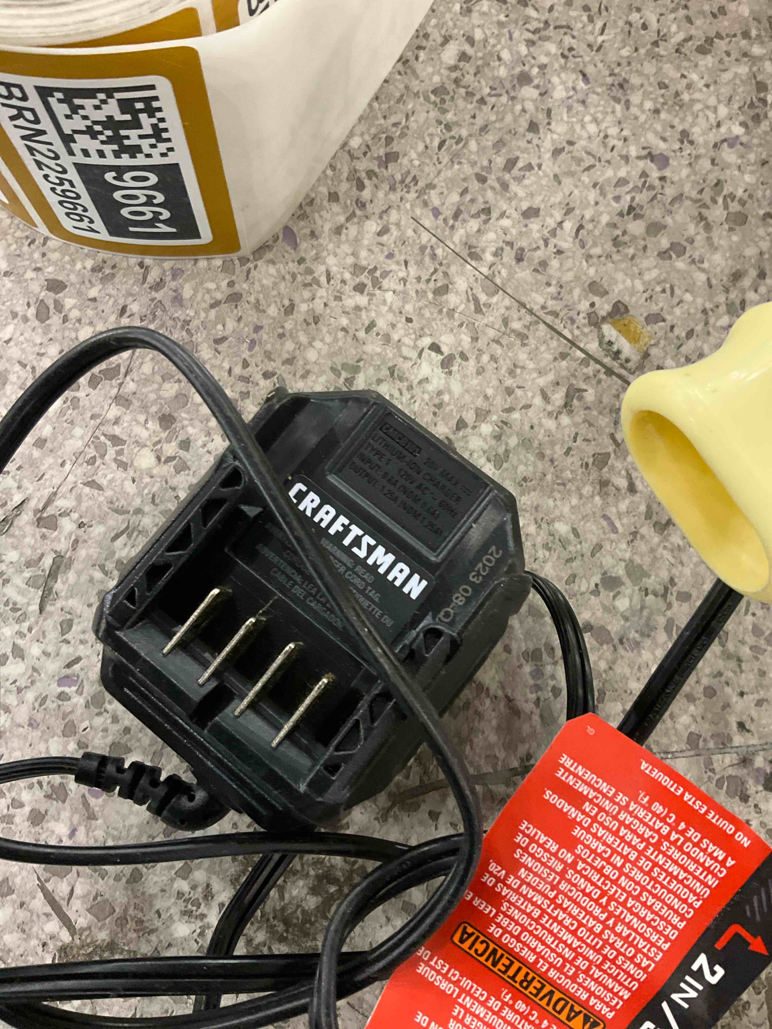 Condition photo showing As Is for charger