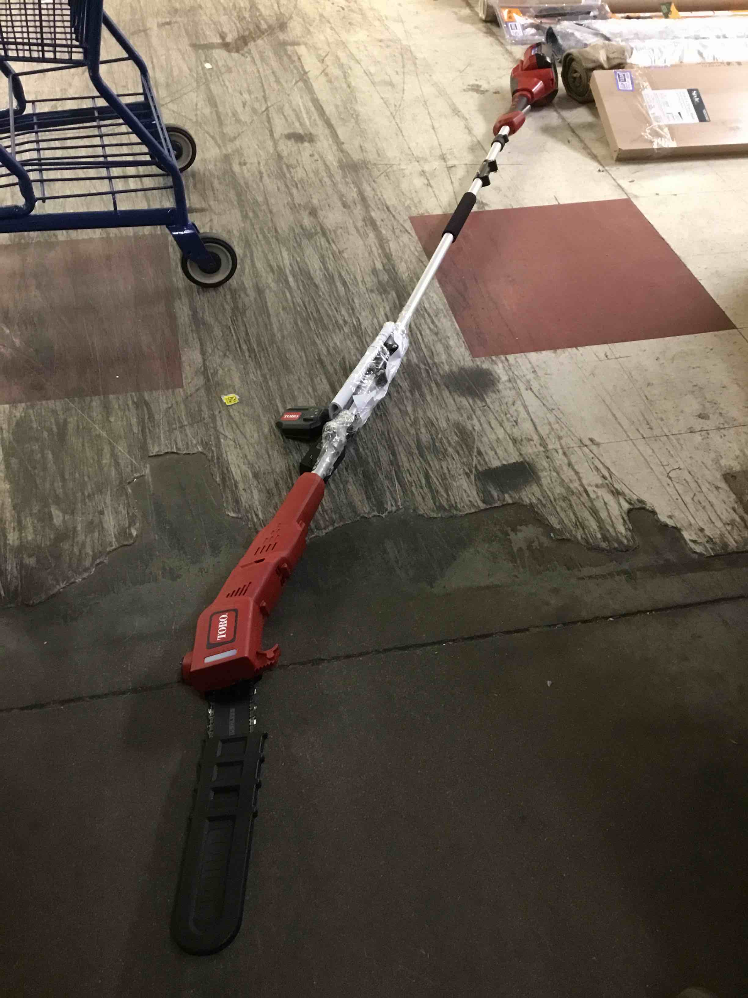 Condition photo showing As Is for toro flex-force 60-volt max 10-in 2 ah battery pole saw (battery and charger included)