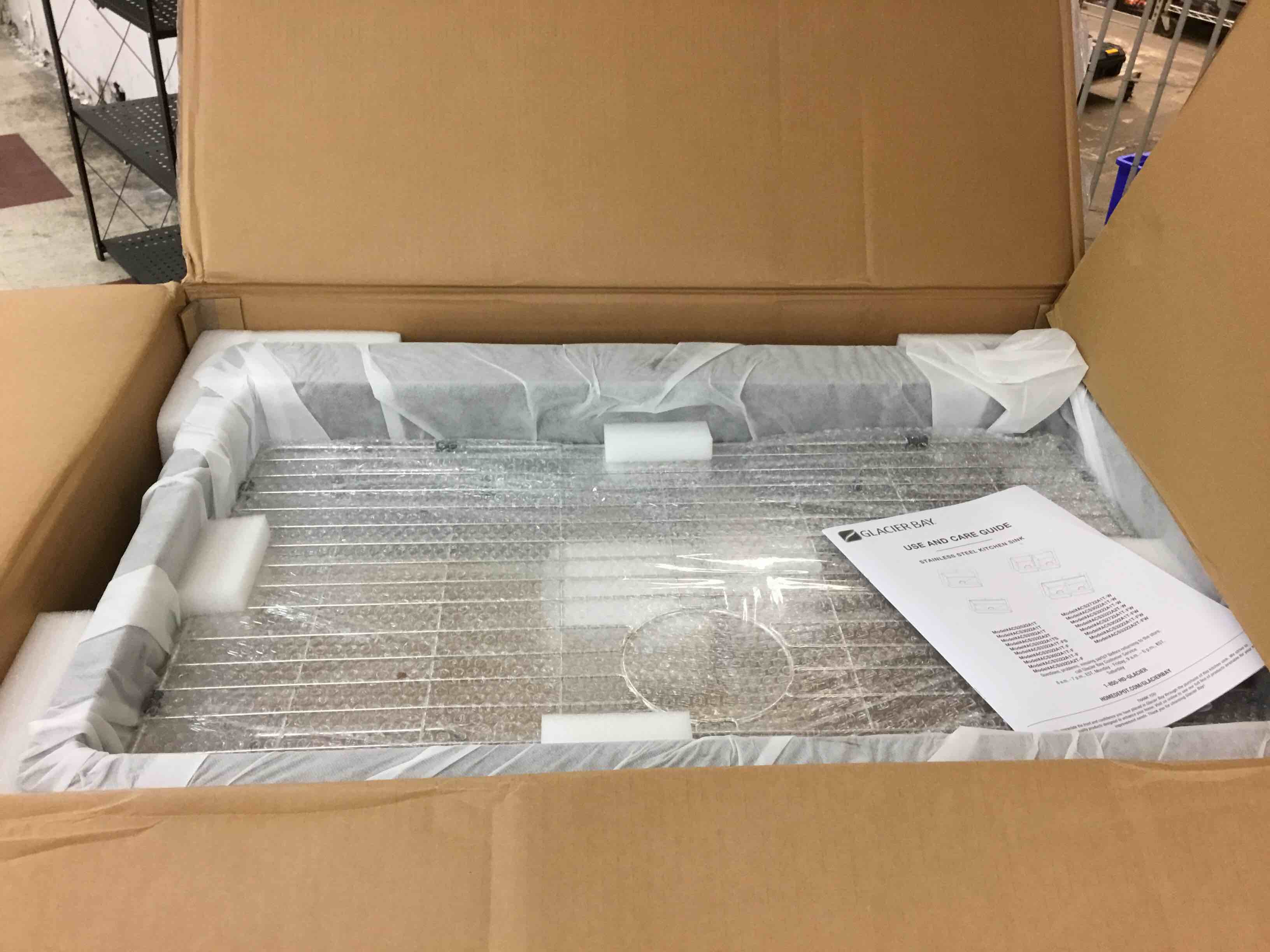 Condition photo showing New/Like New for 33 in. drop-in single bowl 18 gauge gunmetal black stainless steel kitchen sink with black spring neck faucet