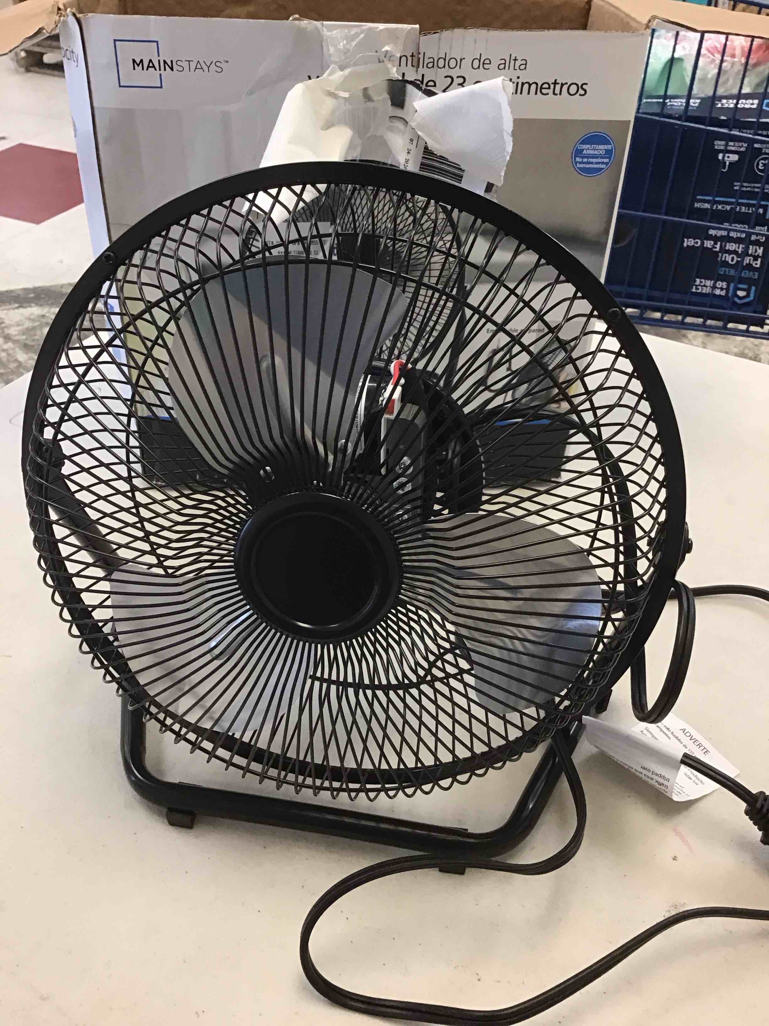Condition photo showing As Is for mainstays 9 in high velocity floor fan wall mount black
