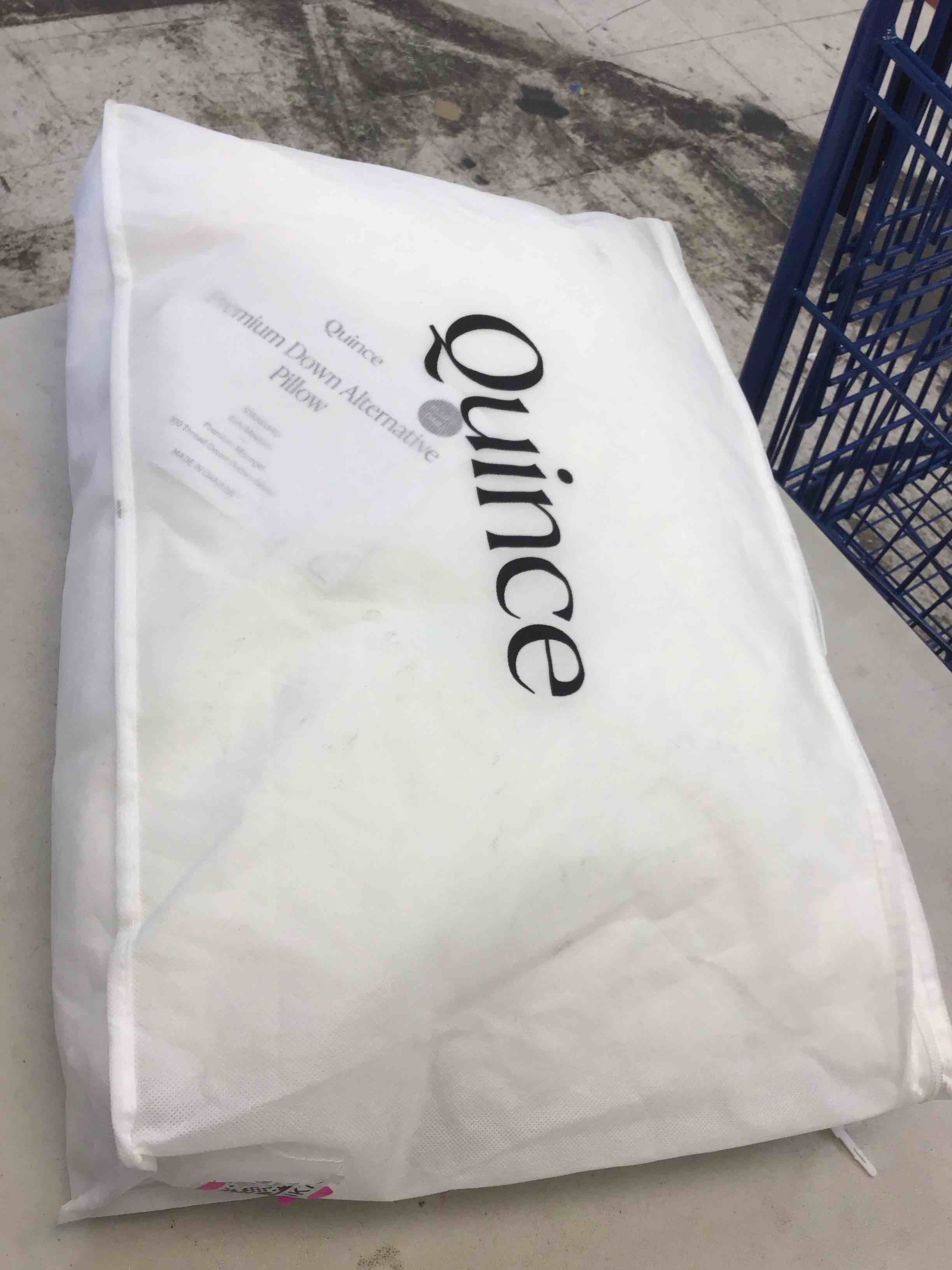 Condition photo showing As Is for quince premium down alternative pillow standard soft/medium 