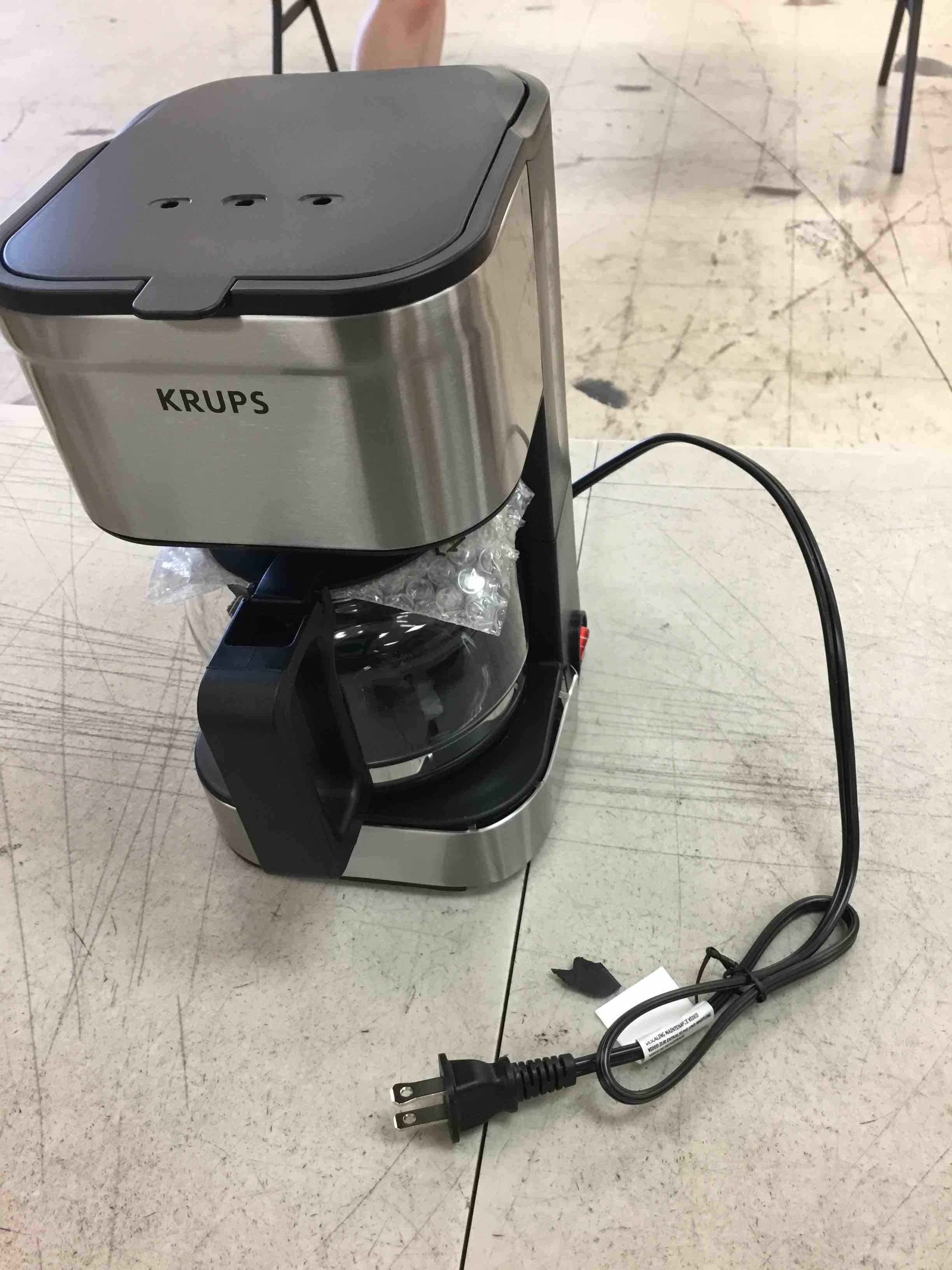 Condition photo showing As Is for krups simply brew compact 5 cup coffee maker: stainless steel design, pause & brew, keep warm, reusable filter, drip-free carafe 5-cup
