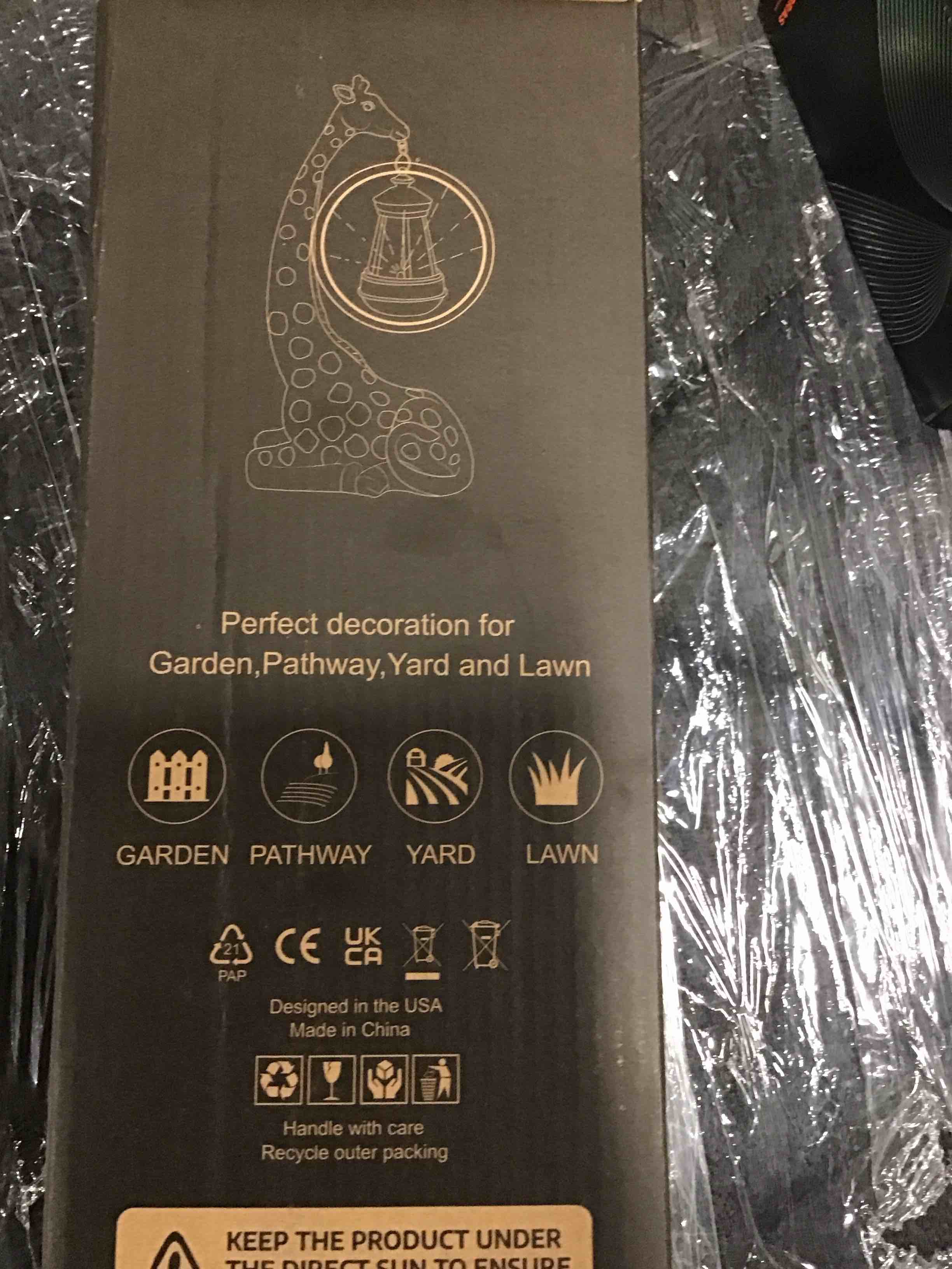 Condition photo showing New/Like New for Giraffe Solar Statue