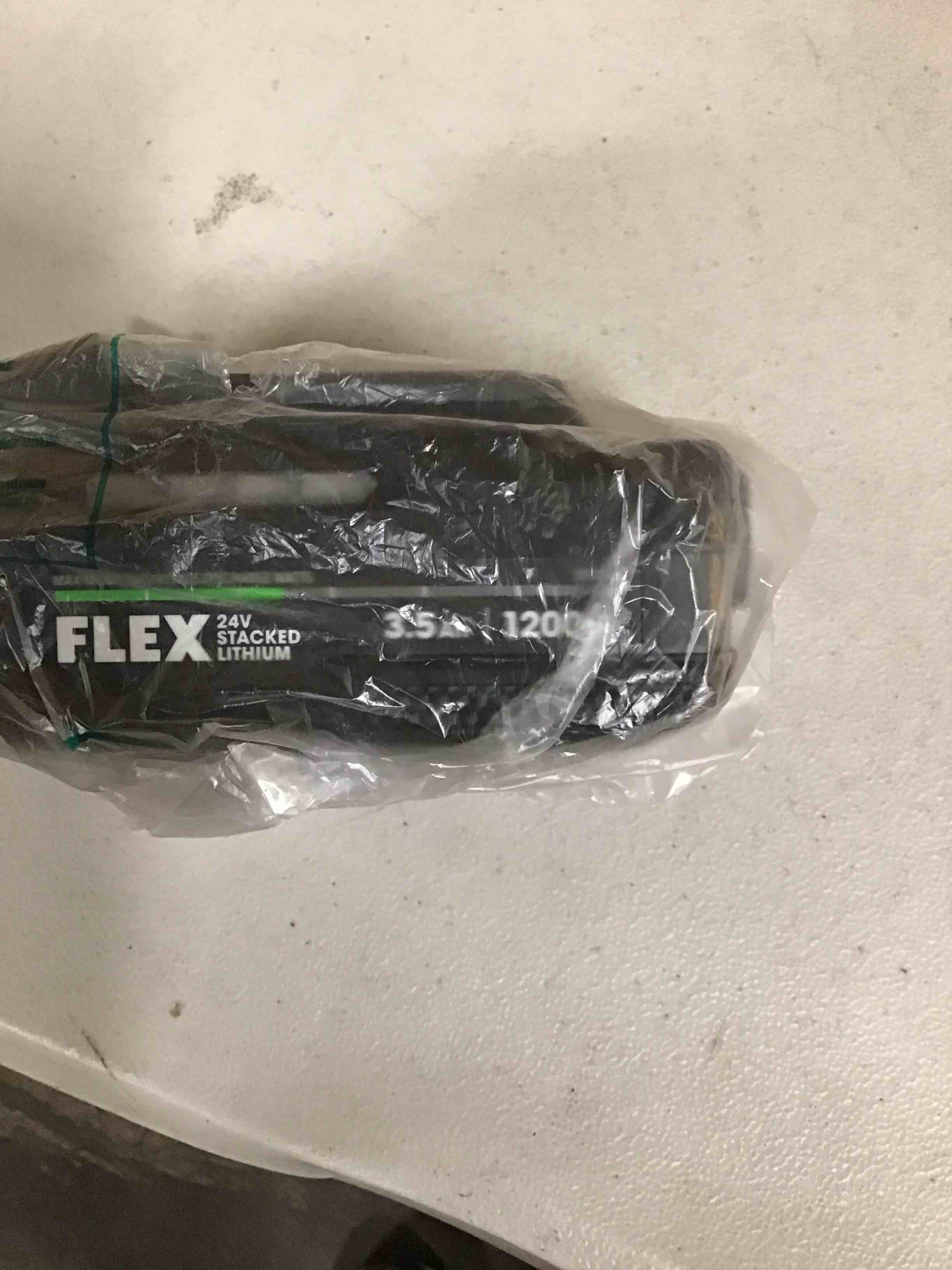 Condition photo showing As Is for flex 24v stacked lithium battery