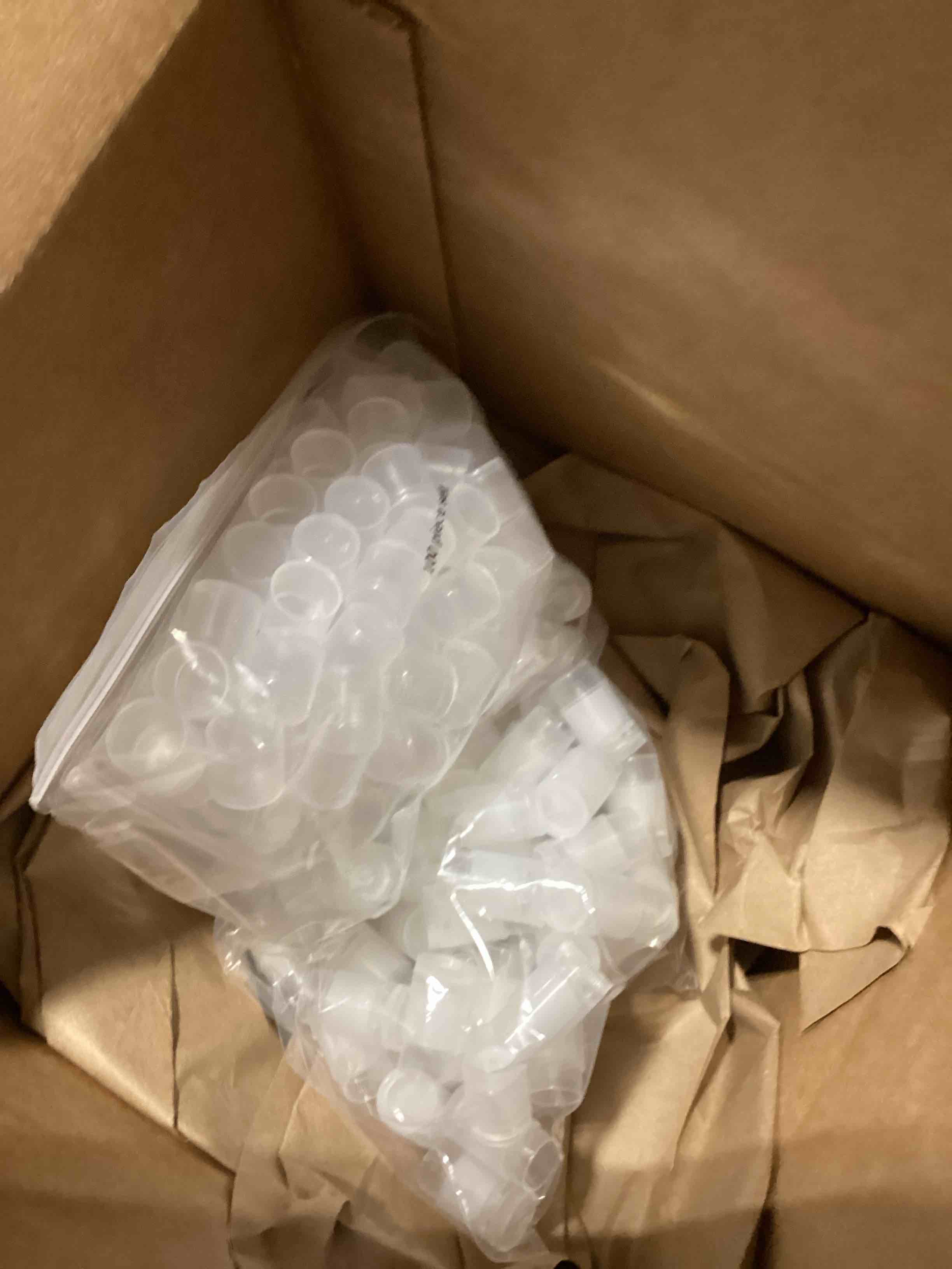 Condition photo showing As Is for 100 pcs natural mini lip balm tube & cap set