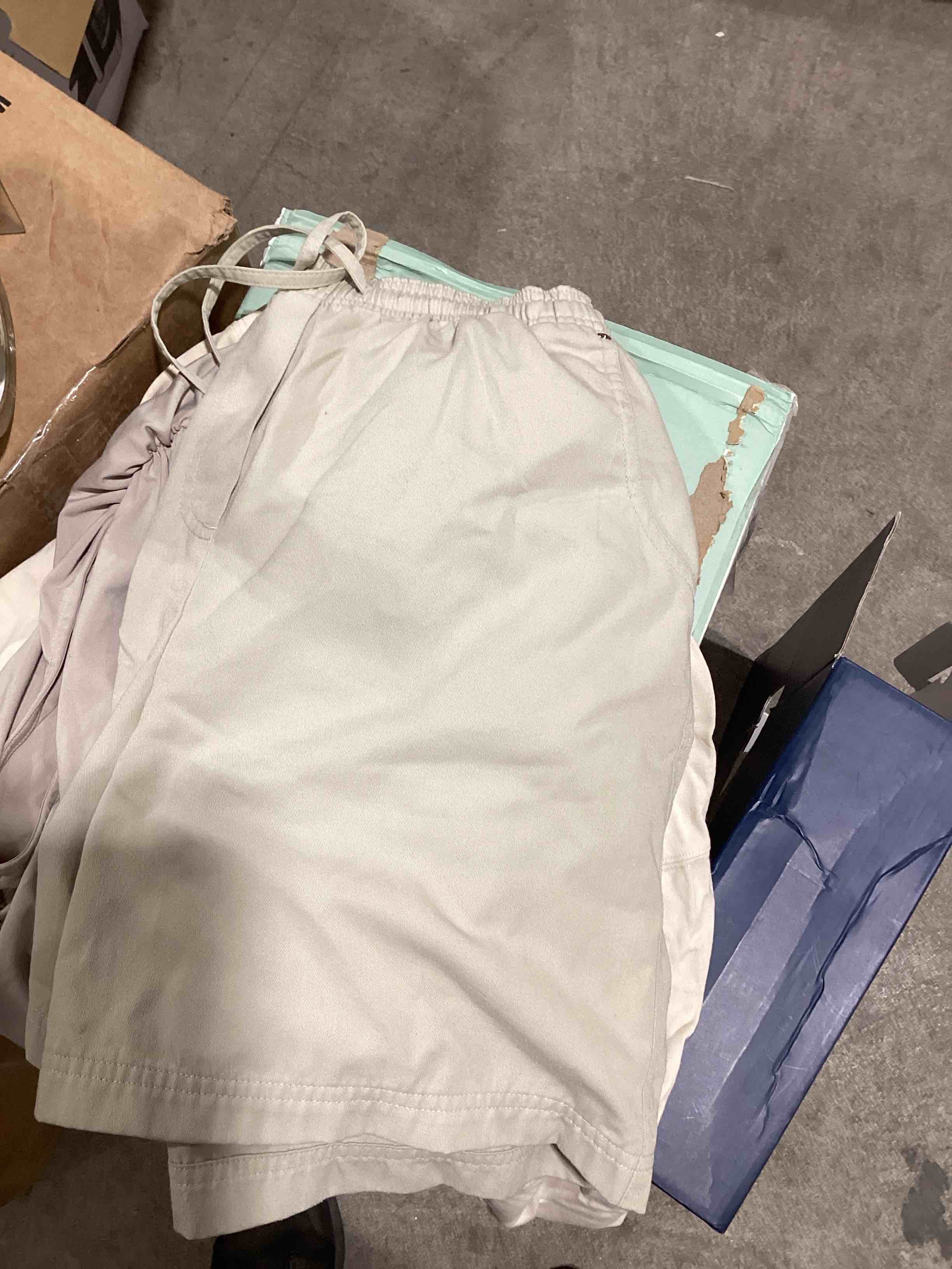 Condition photo showing As Is for phf design meets comfort box with clothing inside 1 t shirt, 1 silk shirt and shorts