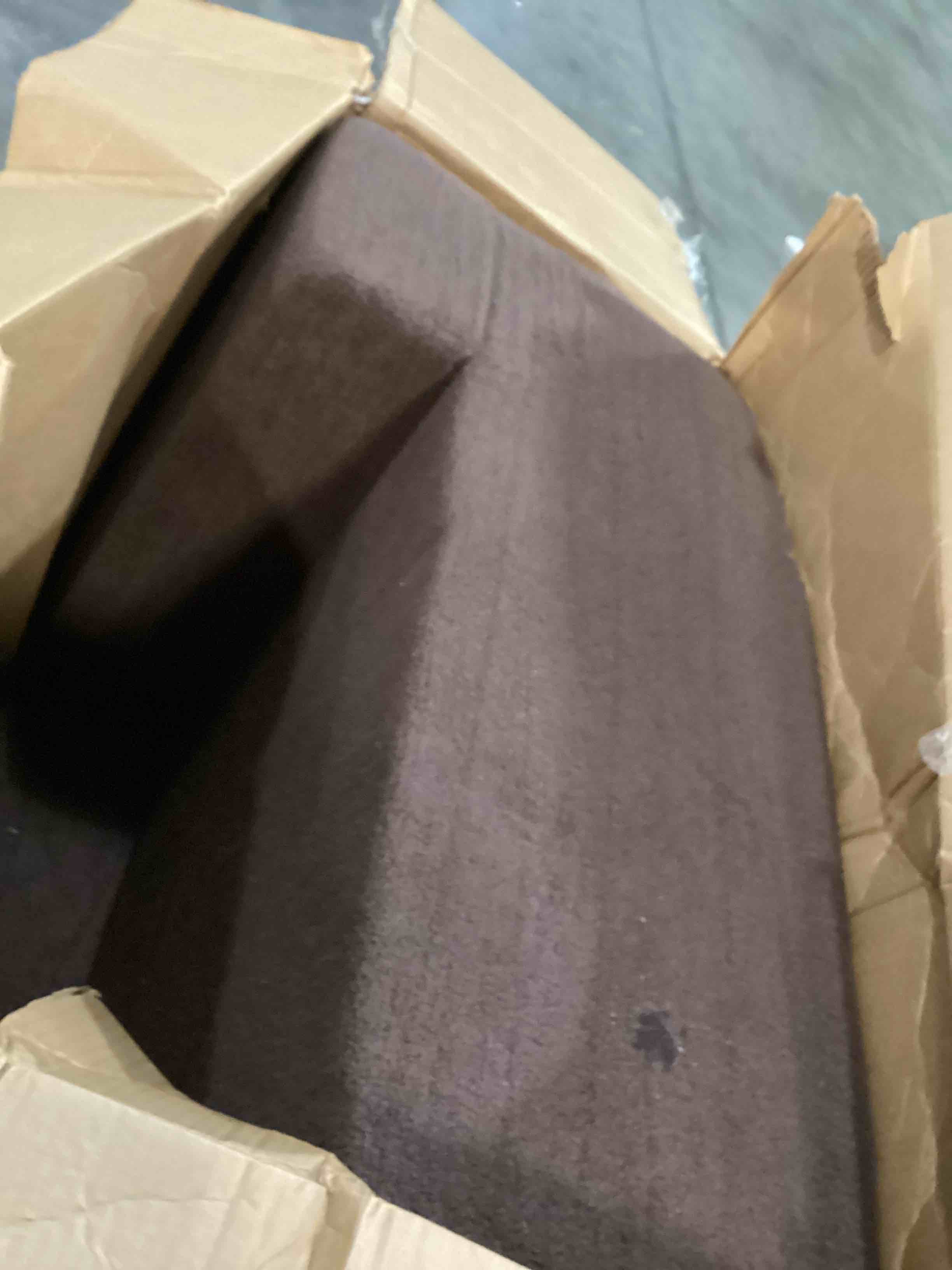 dark brown foam corner chair 