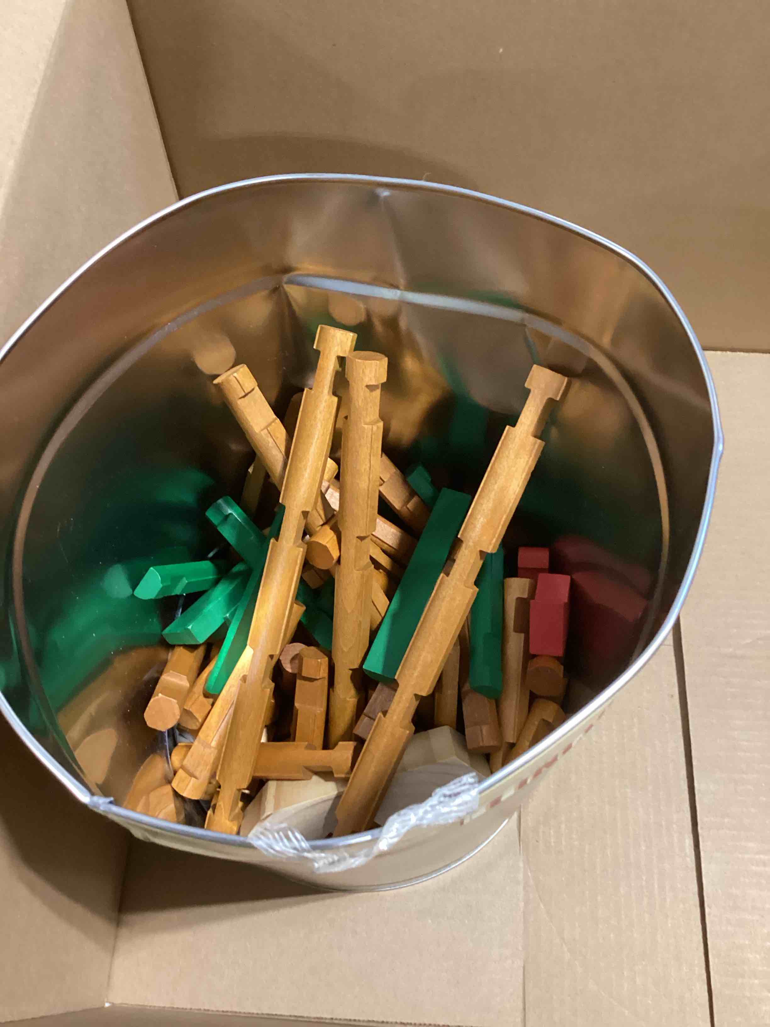 Condition photo showing As Is for Lincoln Logs 100th Anniversary Tin