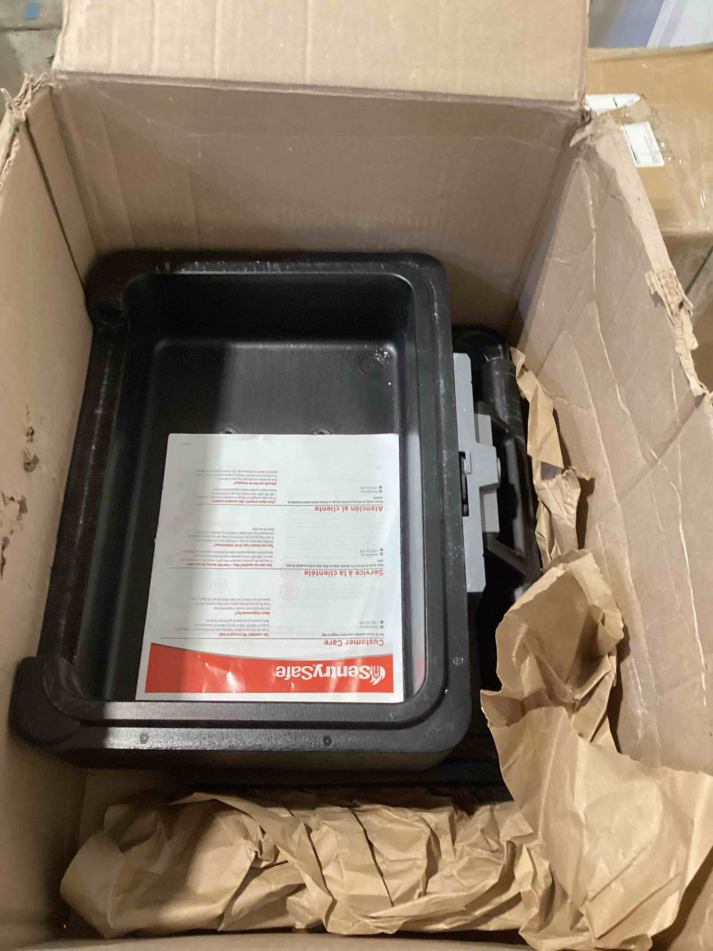 Condition photo showing As Is for SentrySafe Fireproof Safe Box with Key Lock, Chest Safe with Carrying Handle to Secure Money, Jewelry, Documents, 0.25 Cubic Feet, 6.3 x 15.3 x 12.1 Inches, 1160 Fire resistant box 0.25 cu. ft.