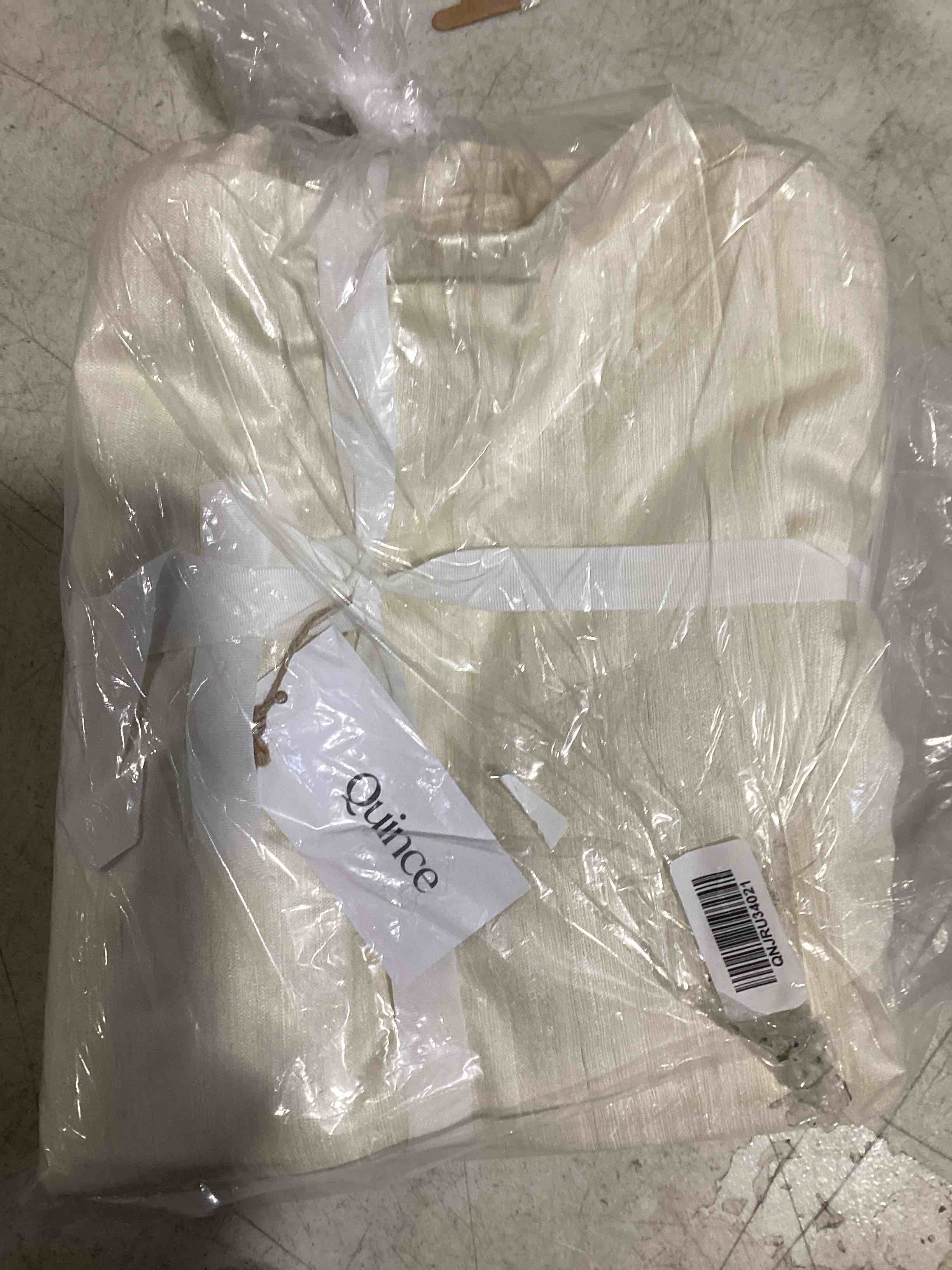 Condition photo showing New/Like New for curtains 