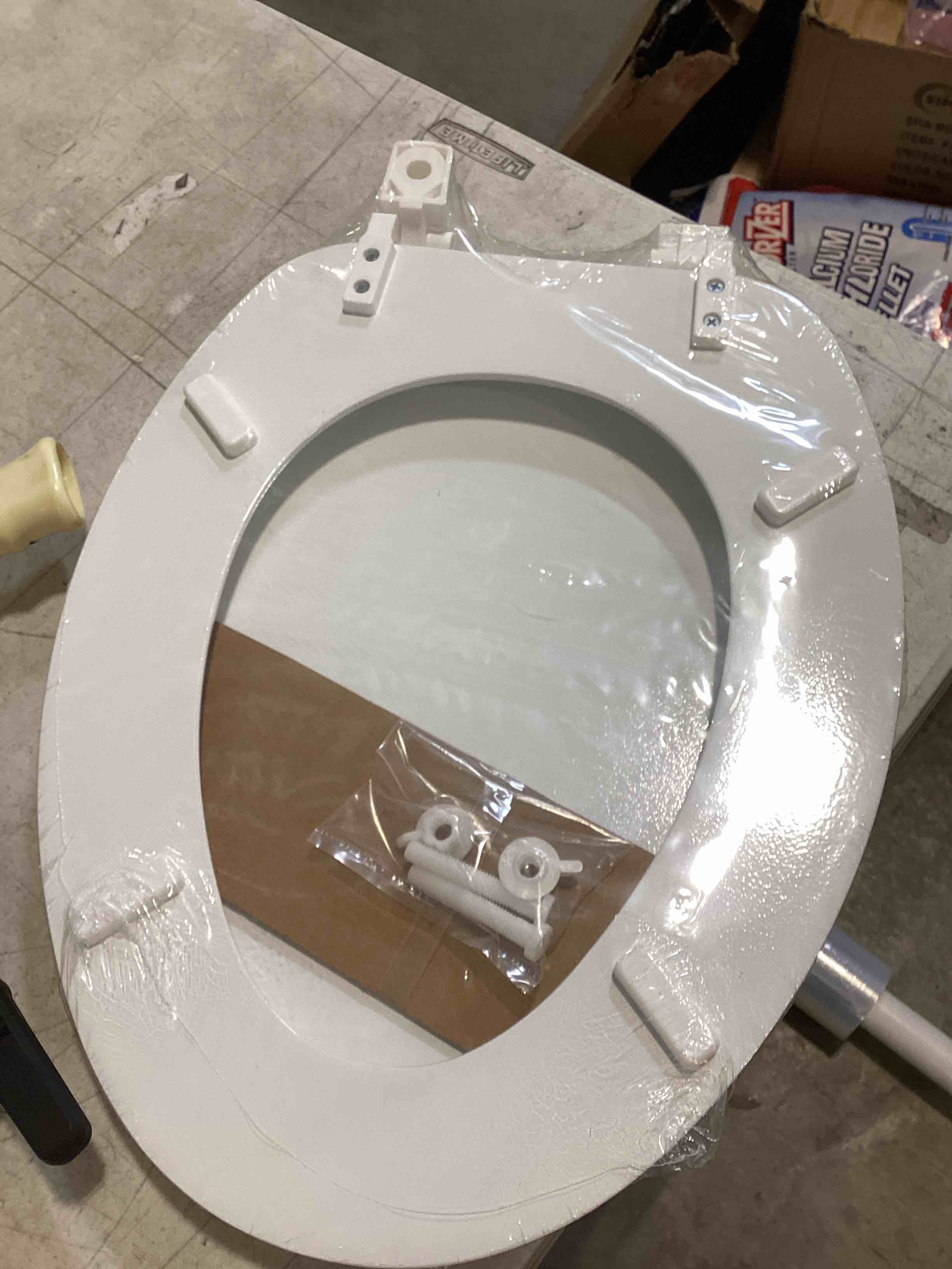 Condition photo showing As Is for toilet seat 