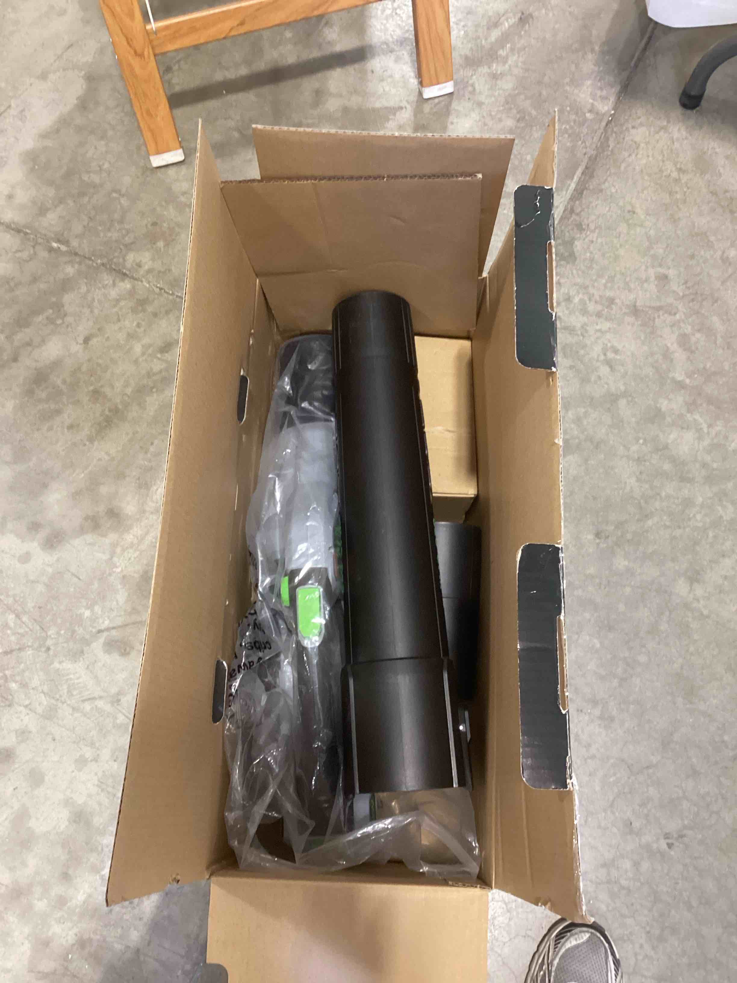 Condition photo showing As Is for ego power+ lb6151 615 cfm variable-speed 56-volt lithium-ion cordless leaf blower with 2.5ah battery and charger, black