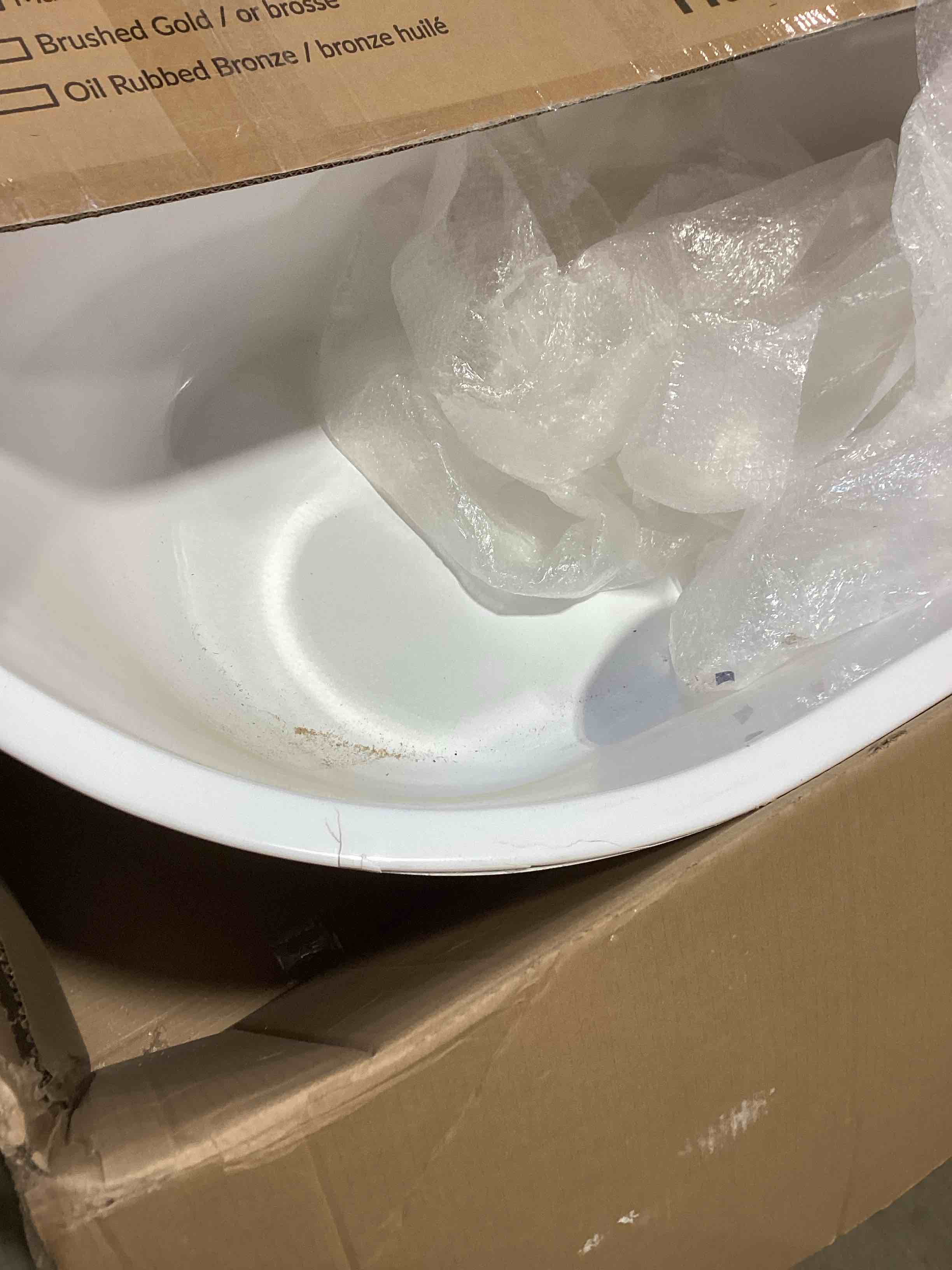 Condition photo showing As Is for woodbridge bathtub 