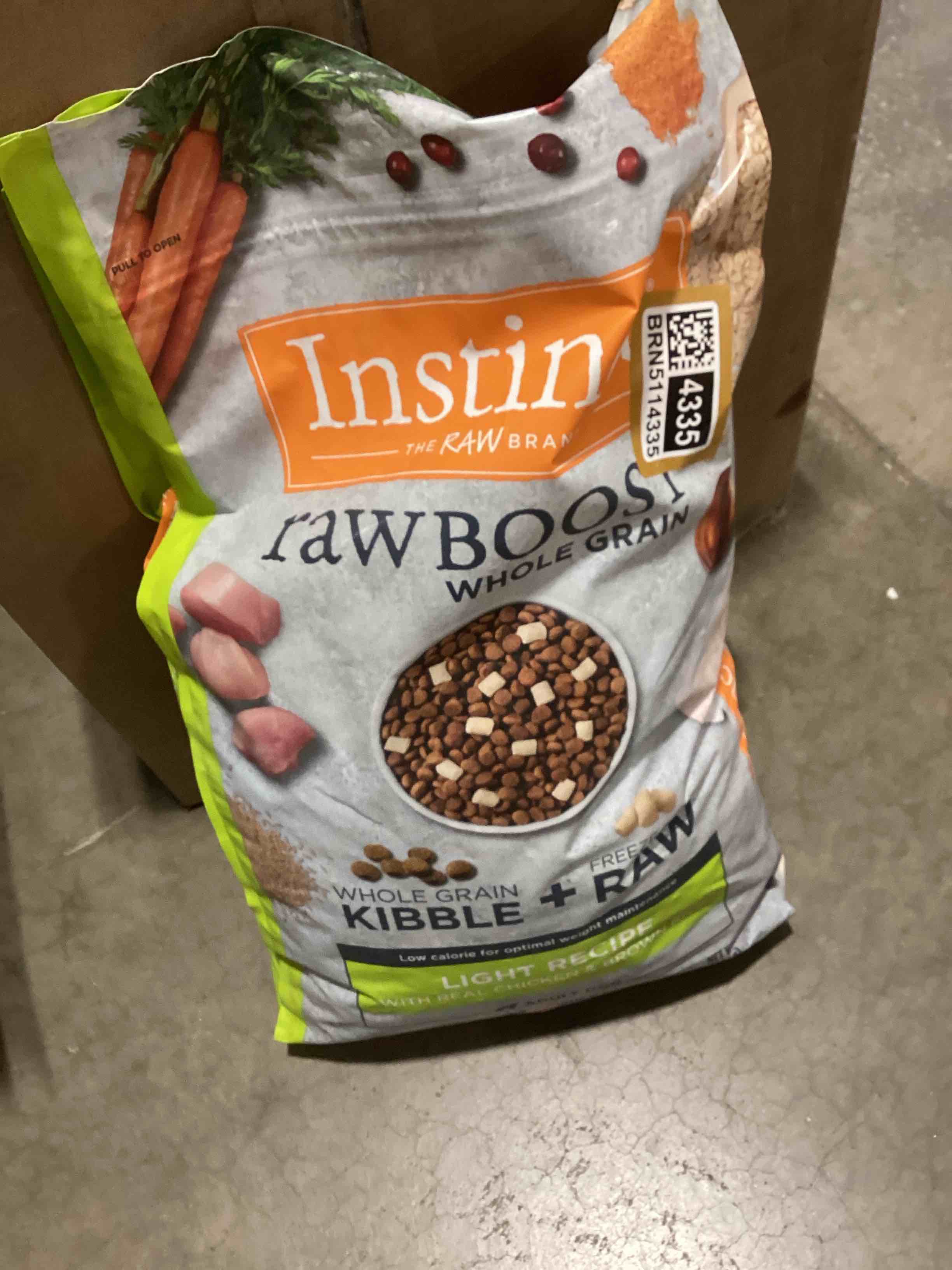 Condition photo showing New/Like New for instinct raw boost light, natural dry dog food with freeze dried pieces, whole grain recipe- real chicken and brown rice, 18 lb. bag