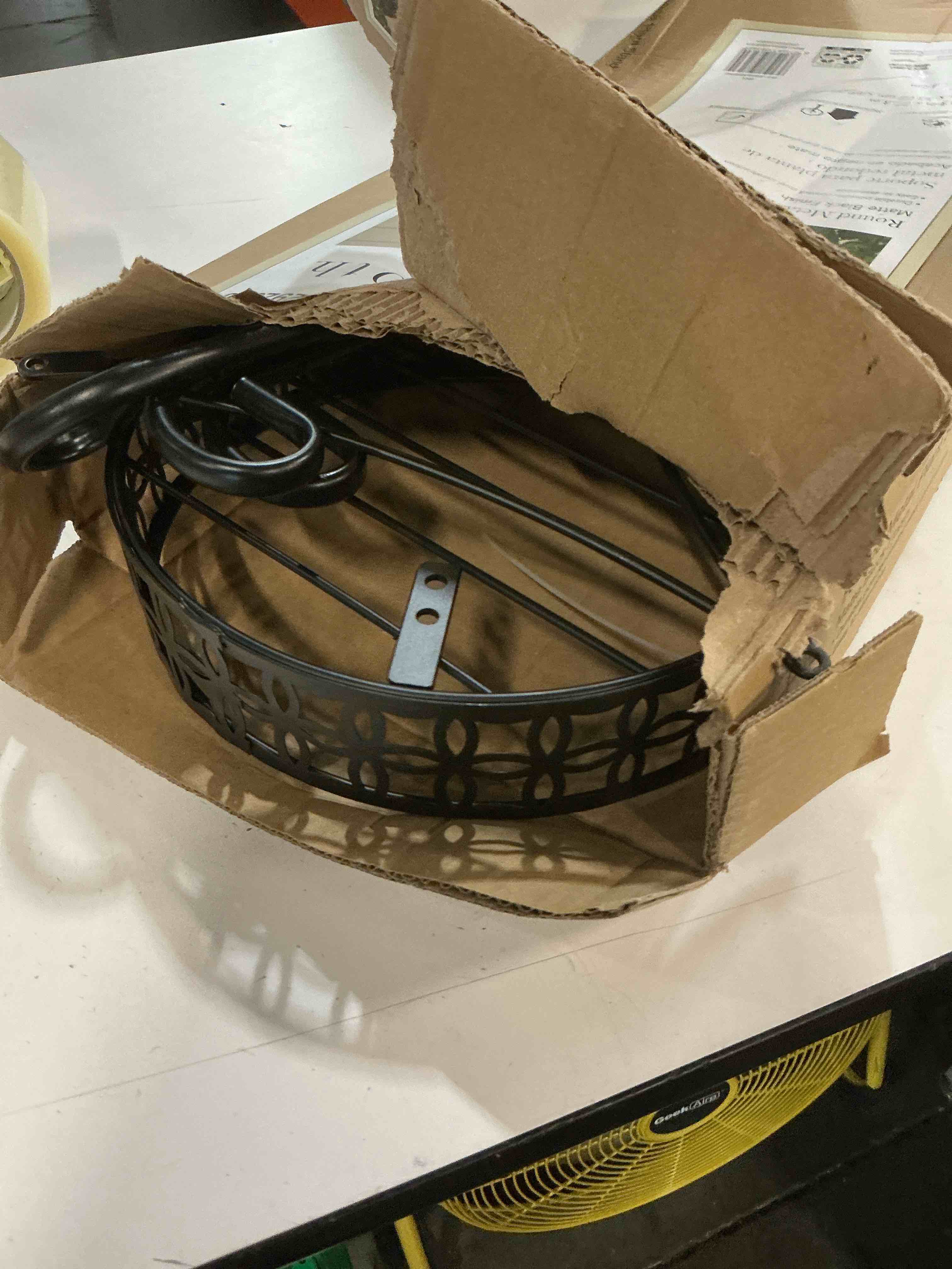 Condition photo showing As Is for 10-in w black indoor/outdoor round steel plant stand