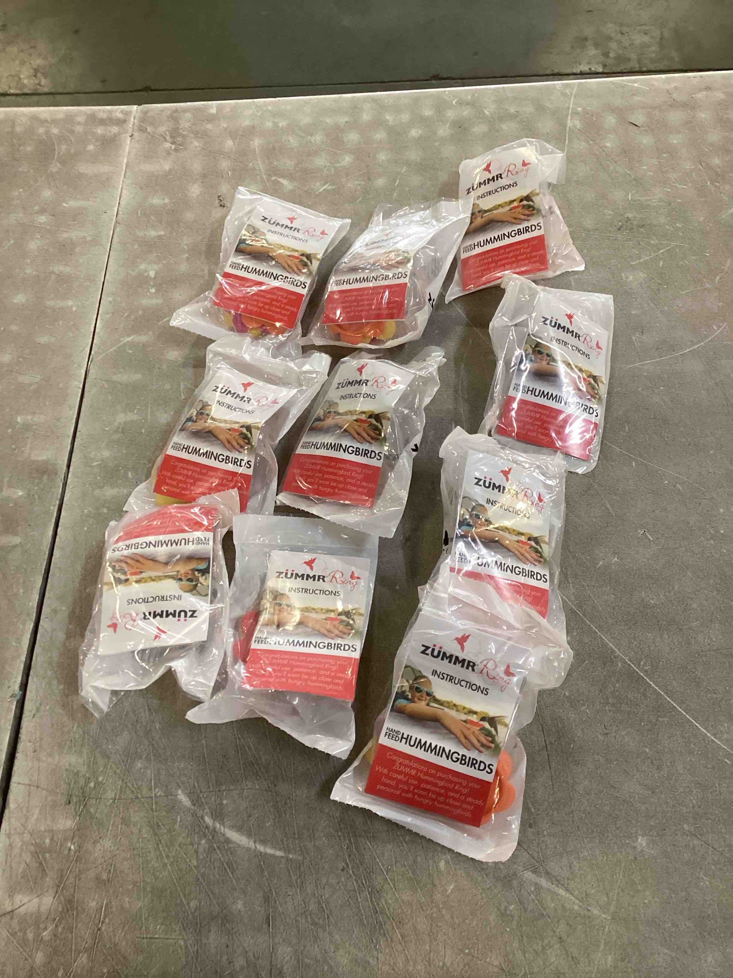 Condition photo showing New/Like New for (3-Pack) - ZUMMR Hummingbird Ring Feeder (Red  Green and Blue) 10 count