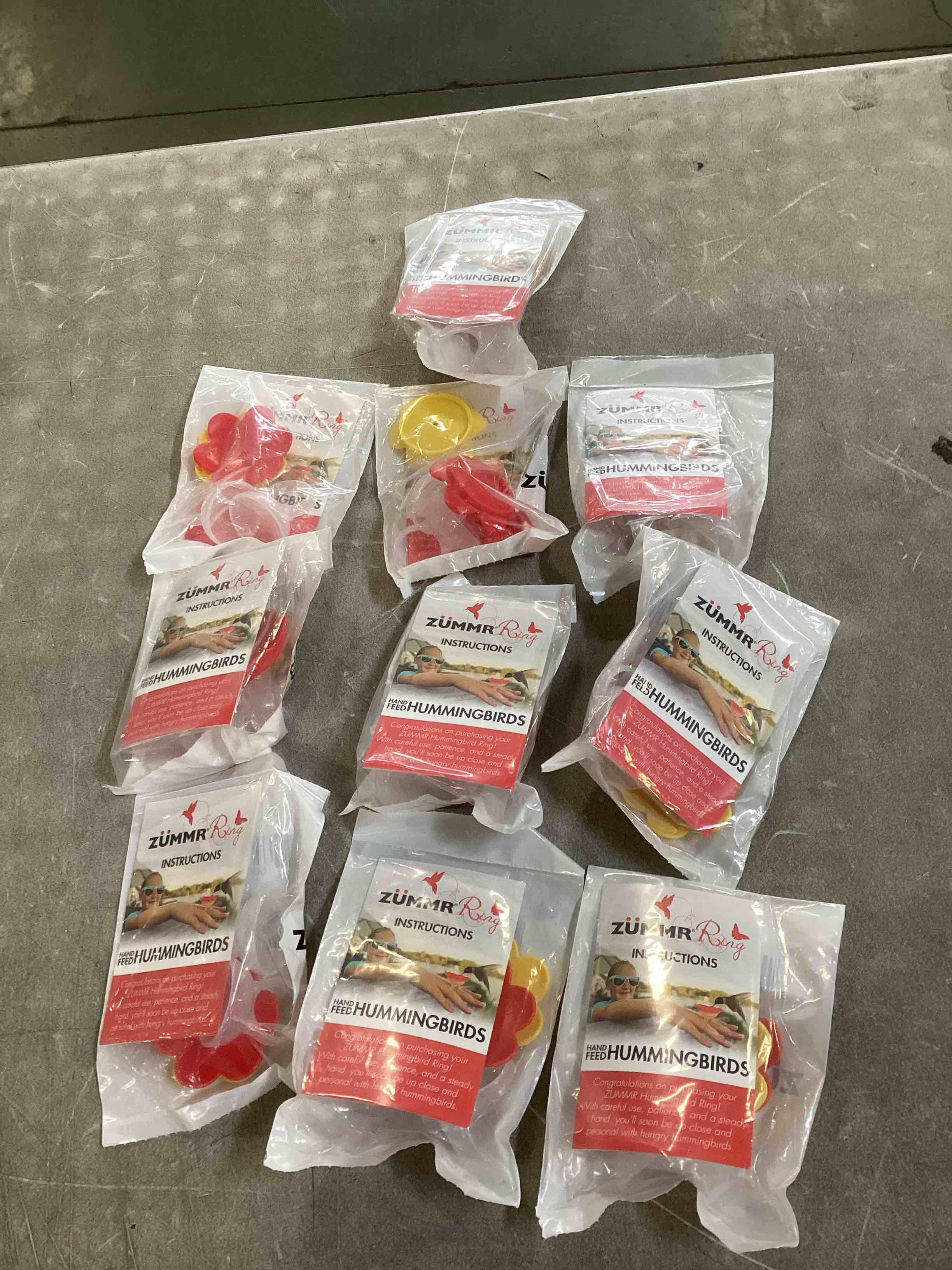 Condition photo showing New/Like New for 2-Pack - ZUMMR Hummingbird Ring Feeder - Hand Feed Hummingbirds Right in Your Backyard. Get up Close and Personal with Nature. Proudly Made in The U.S.A. - The Original (10 count)