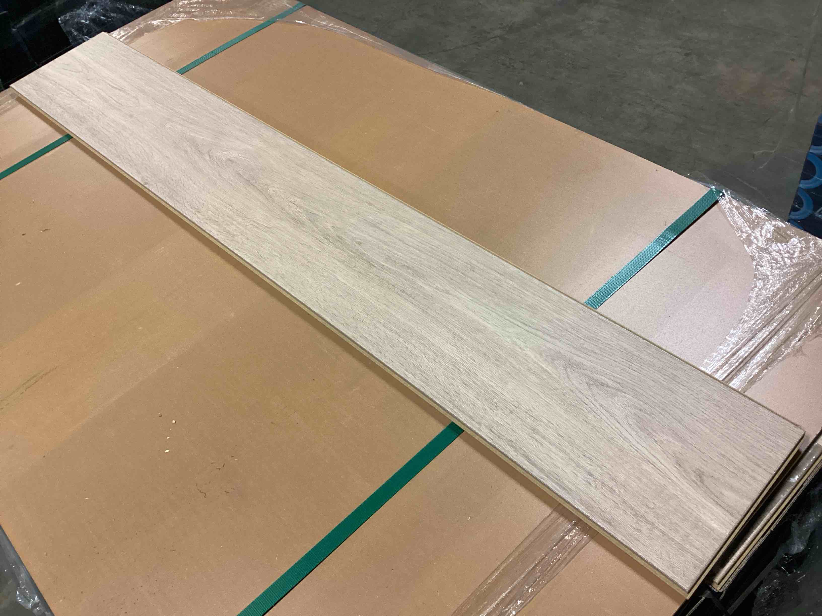 Condition photo showing New/Like New for 589.56 Sq.Ft. Of 12mm AquaGuard Laminate Flooring, Your Bid Per Sq.Ft