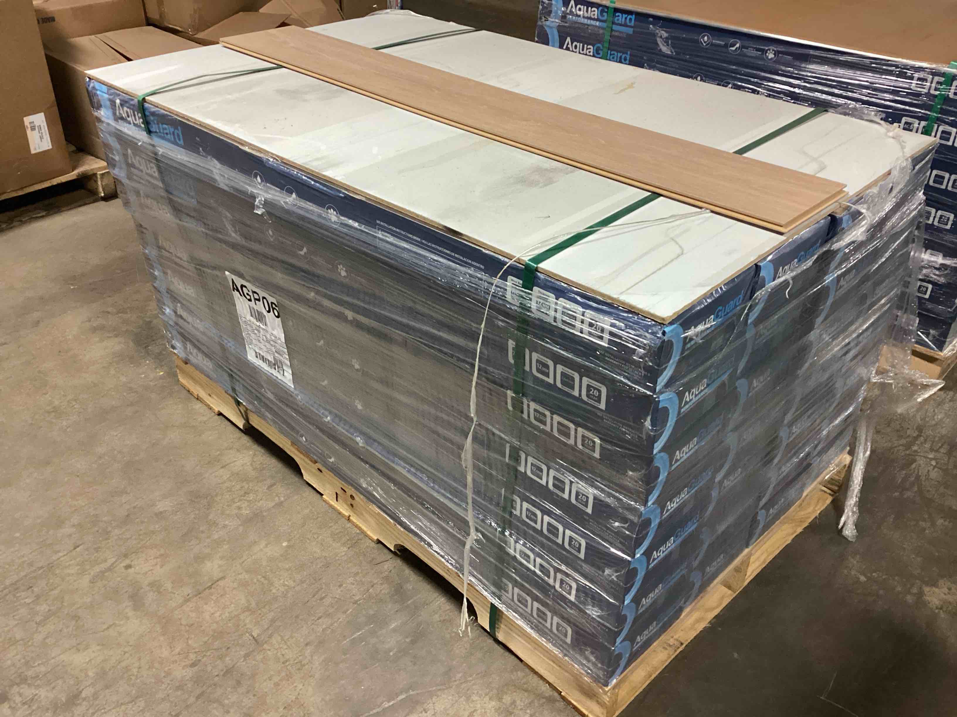 589.56 sq.ft. of 12mm aquaguard laminate flooring, your bid per sq.ft