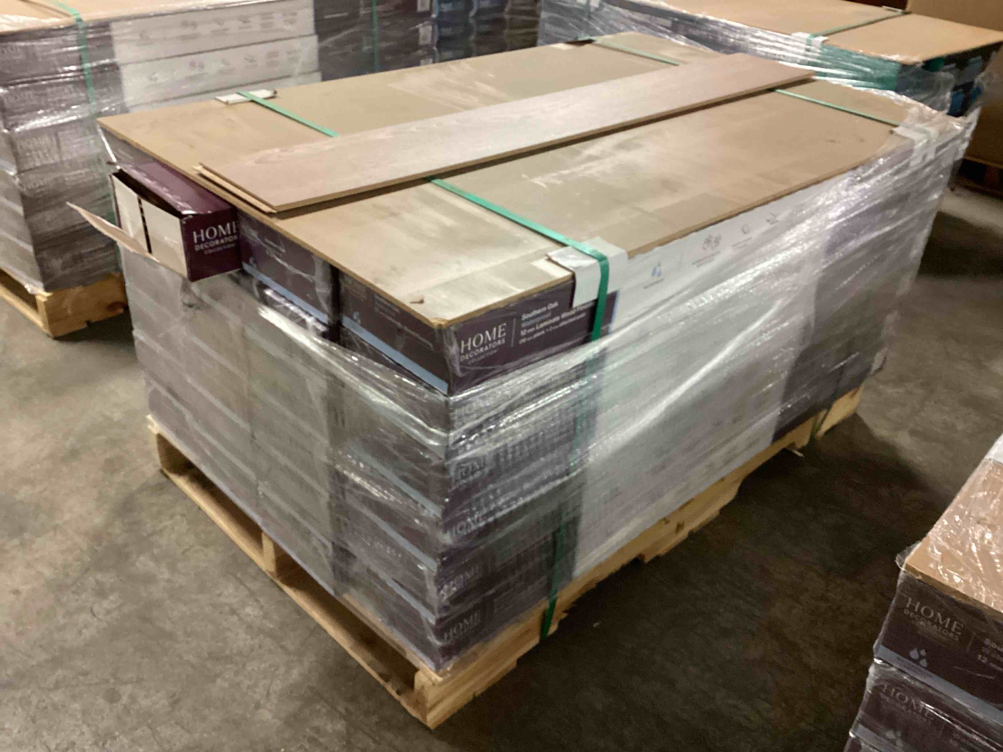 505.35 sq.ft. of 12mm (10mm plank + 2mm attached pad) laminate flooring, your bid per sq.ft