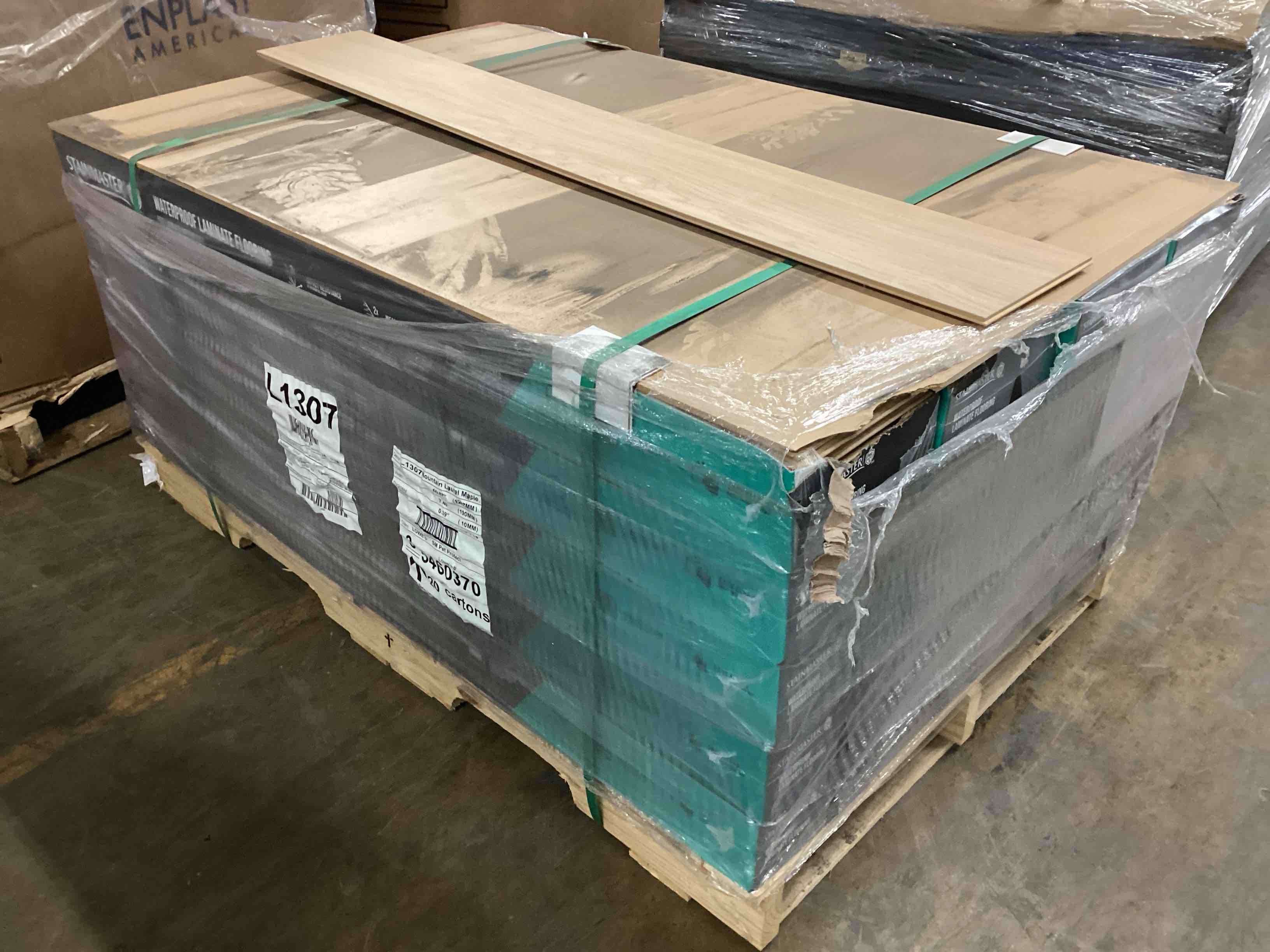 473.77 sq.ft. of 10mm stainmaster laminate flooring, your bid per sq.ft