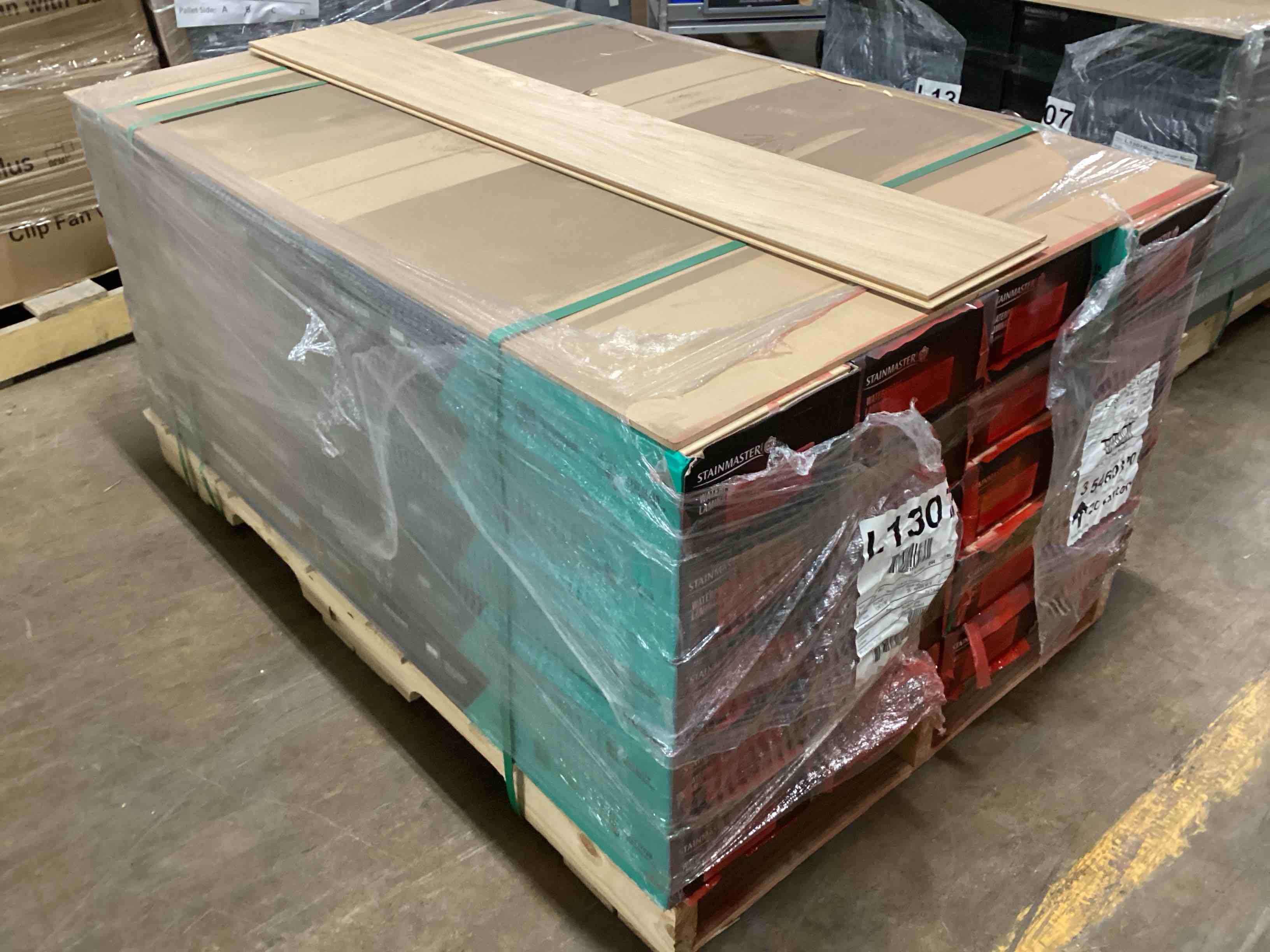 473.77 sq.ft. of 10mm stainmaster laminate flooring, your bid per sq.ft