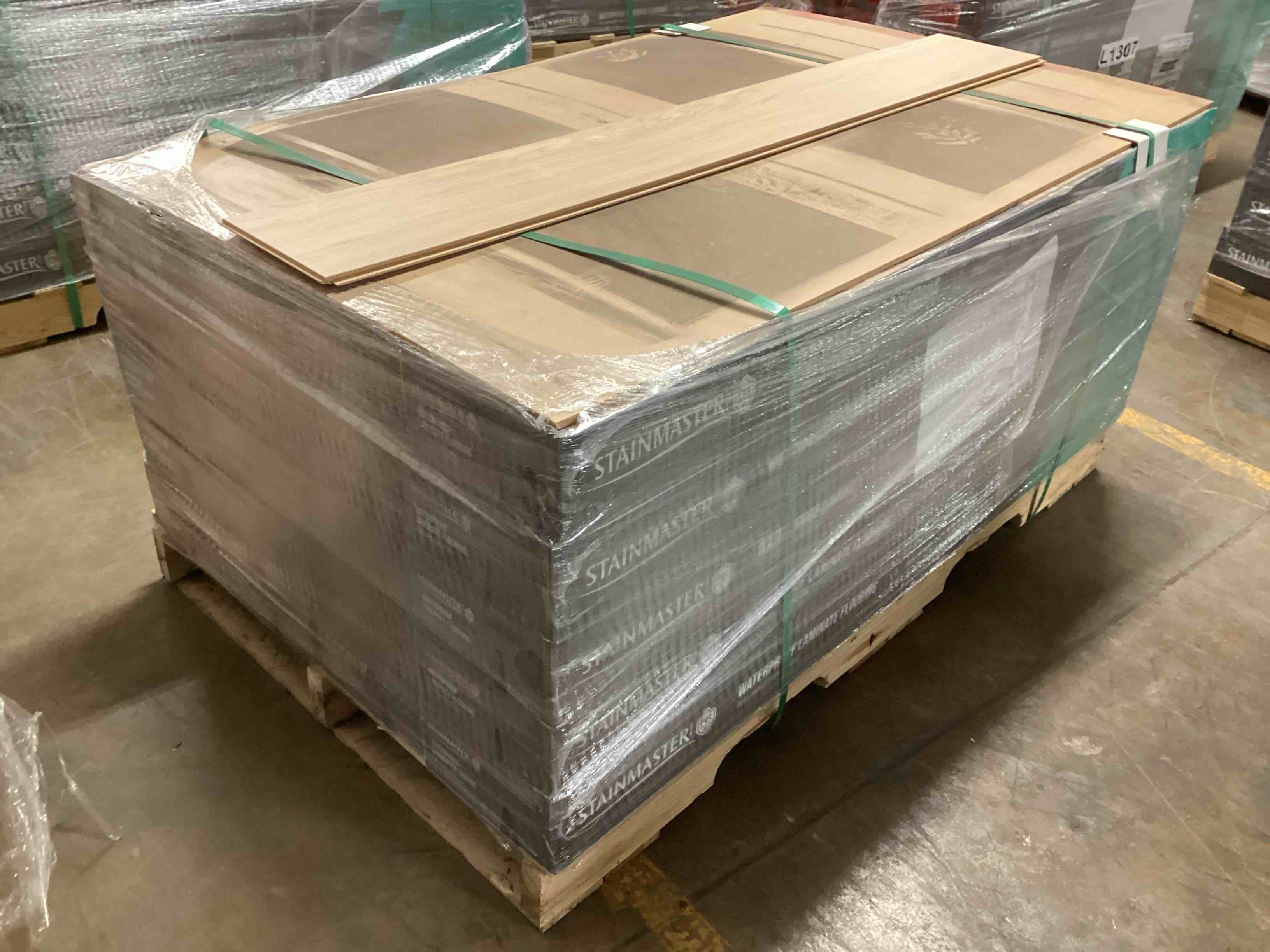 473.77 sq.ft. of 10mm stainmaster laminate flooring, your bid per sq.ft