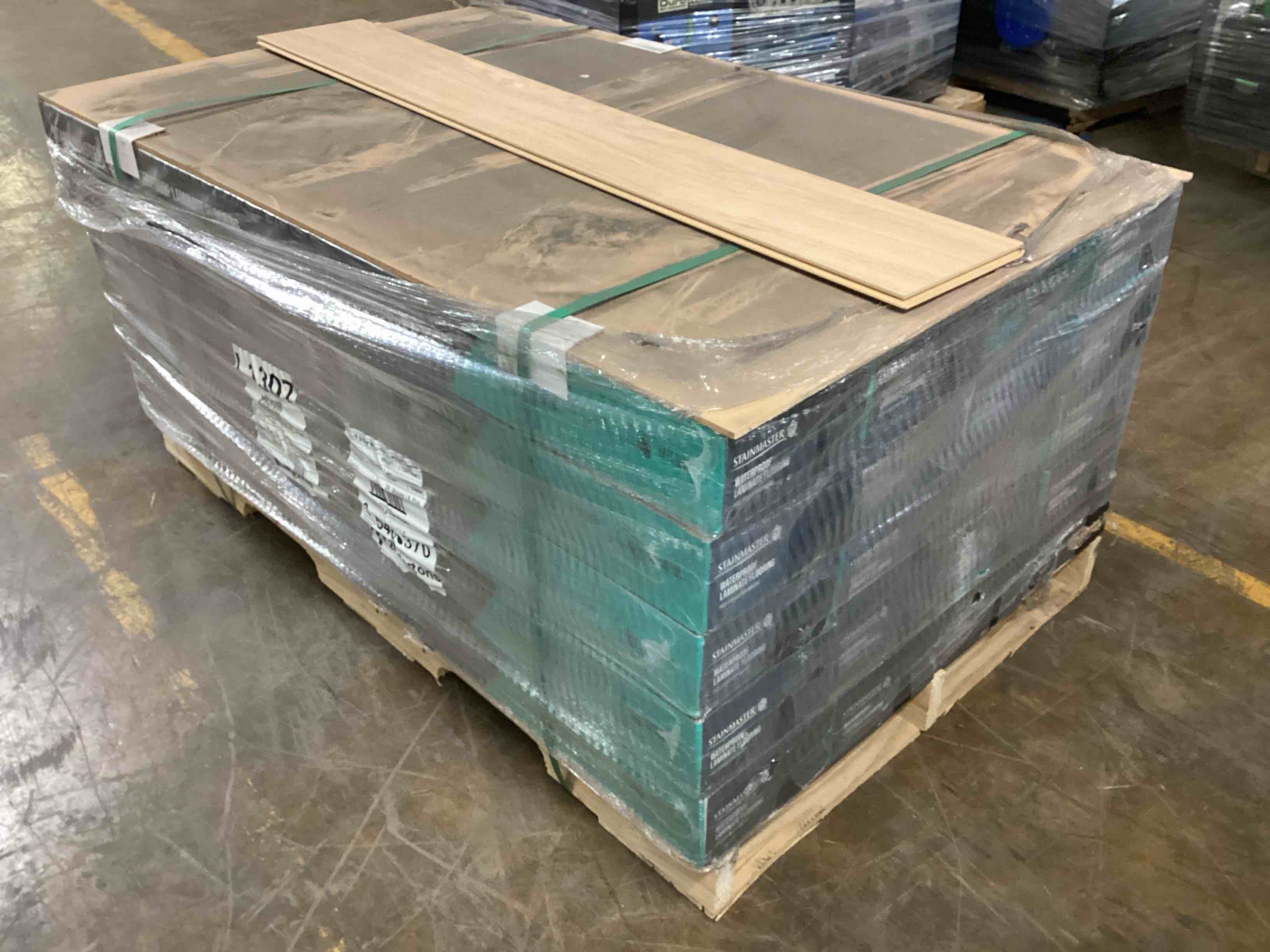 473.77 sq.ft. of 10mm stainmaster laminate flooring, your bid per sq.ft