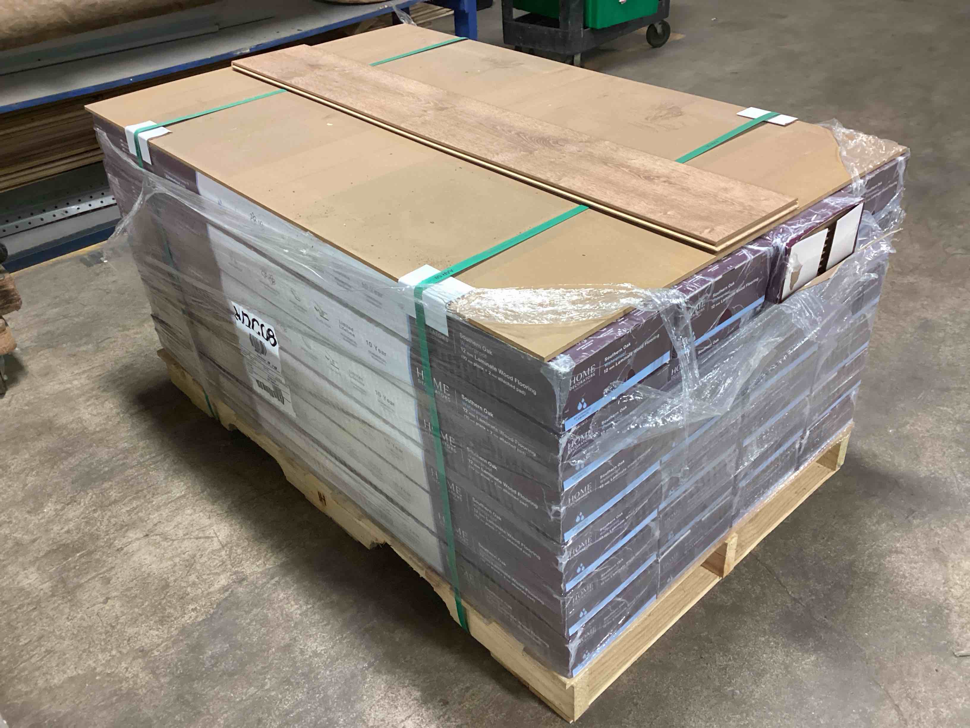 505.35 sq.ft. of 12mm (10mm plank + 2mm attached pad) laminate flooring, your bid per sq.ft