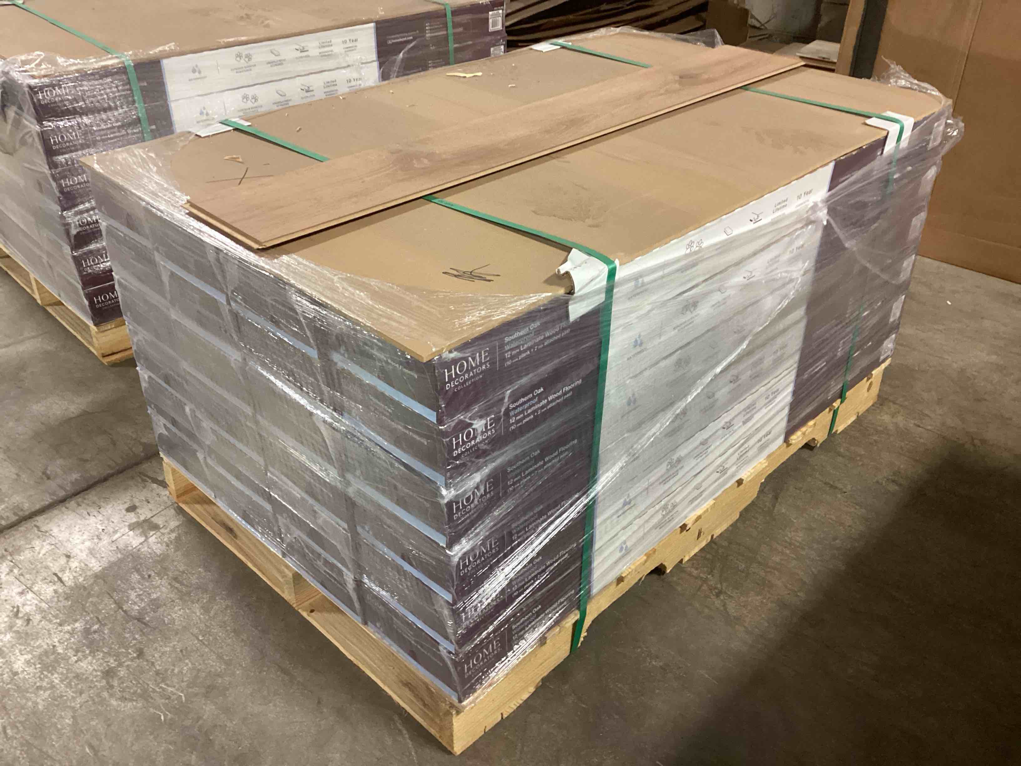 505.35 sq.ft. of 12mm (10mm plank + 2mm attached pad) laminate flooring, your bid per sq.ft