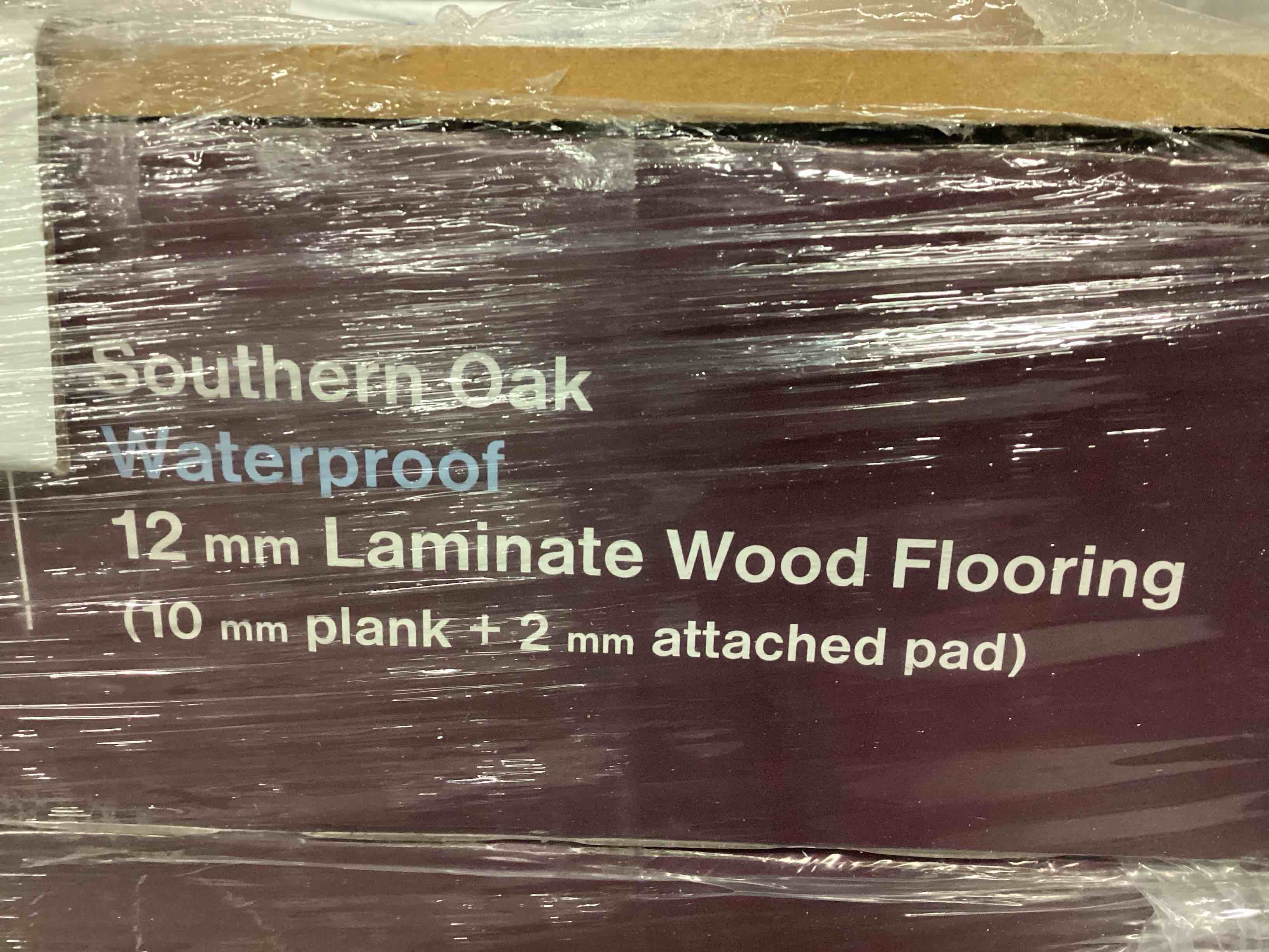 505.35 Sq.Ft. Of 12mm (10mm Plank + 2mm Attached Pad) Laminate Flooring, Your Bid Per Sq.Ft