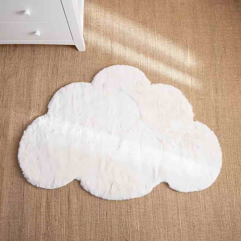 white cloud shape rug