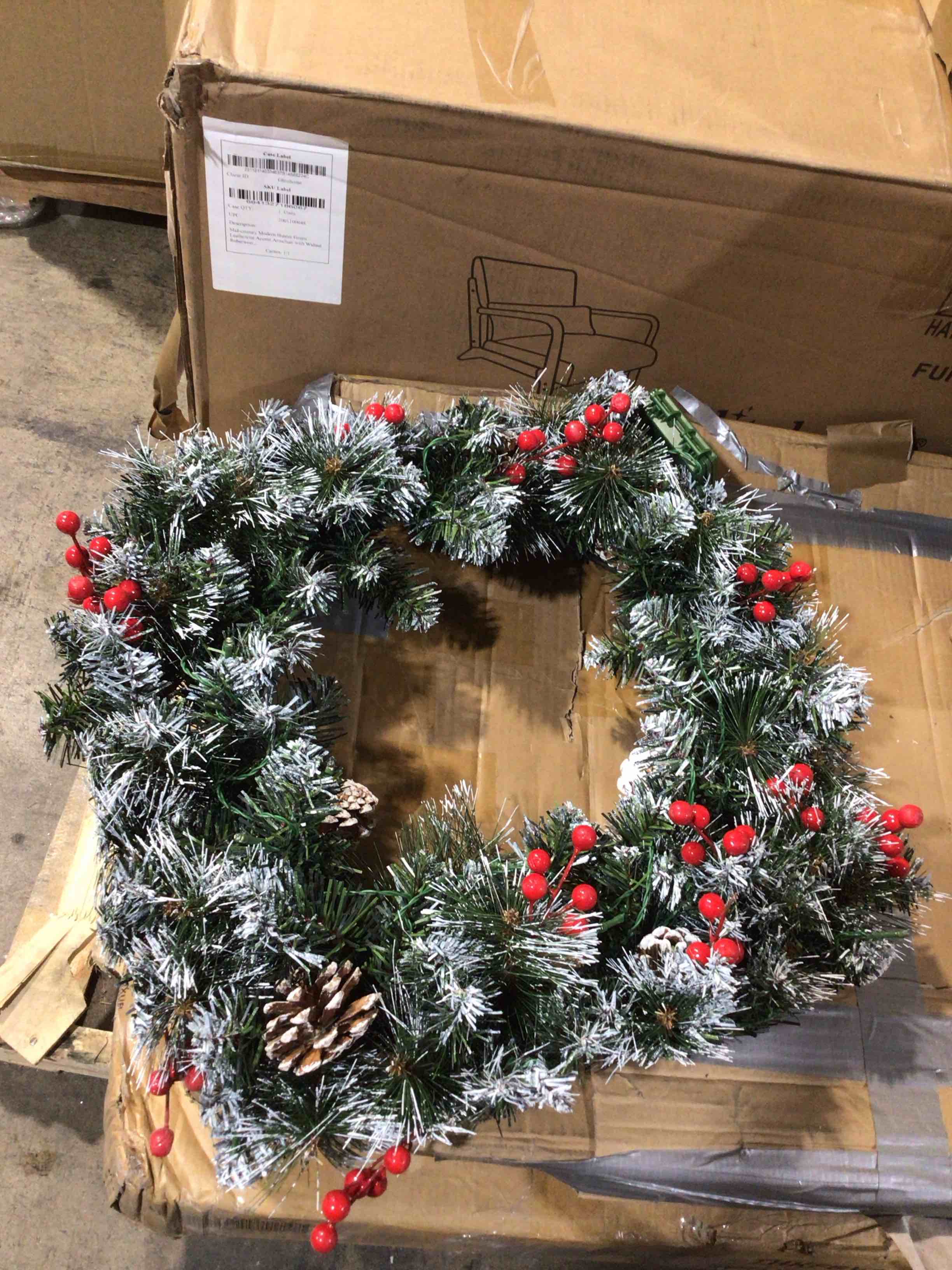 Condition photo showing Good Condition for National Tree Company 24 in Pre-Lit Wintry Pine Flocked Artificial Christmas Wreath, Christmas Decoration with Pinecones, Red Berries, 50 Clear LED Lights, 113 Tips, Timer, Green 24 in w/ Battery Operated Wreath