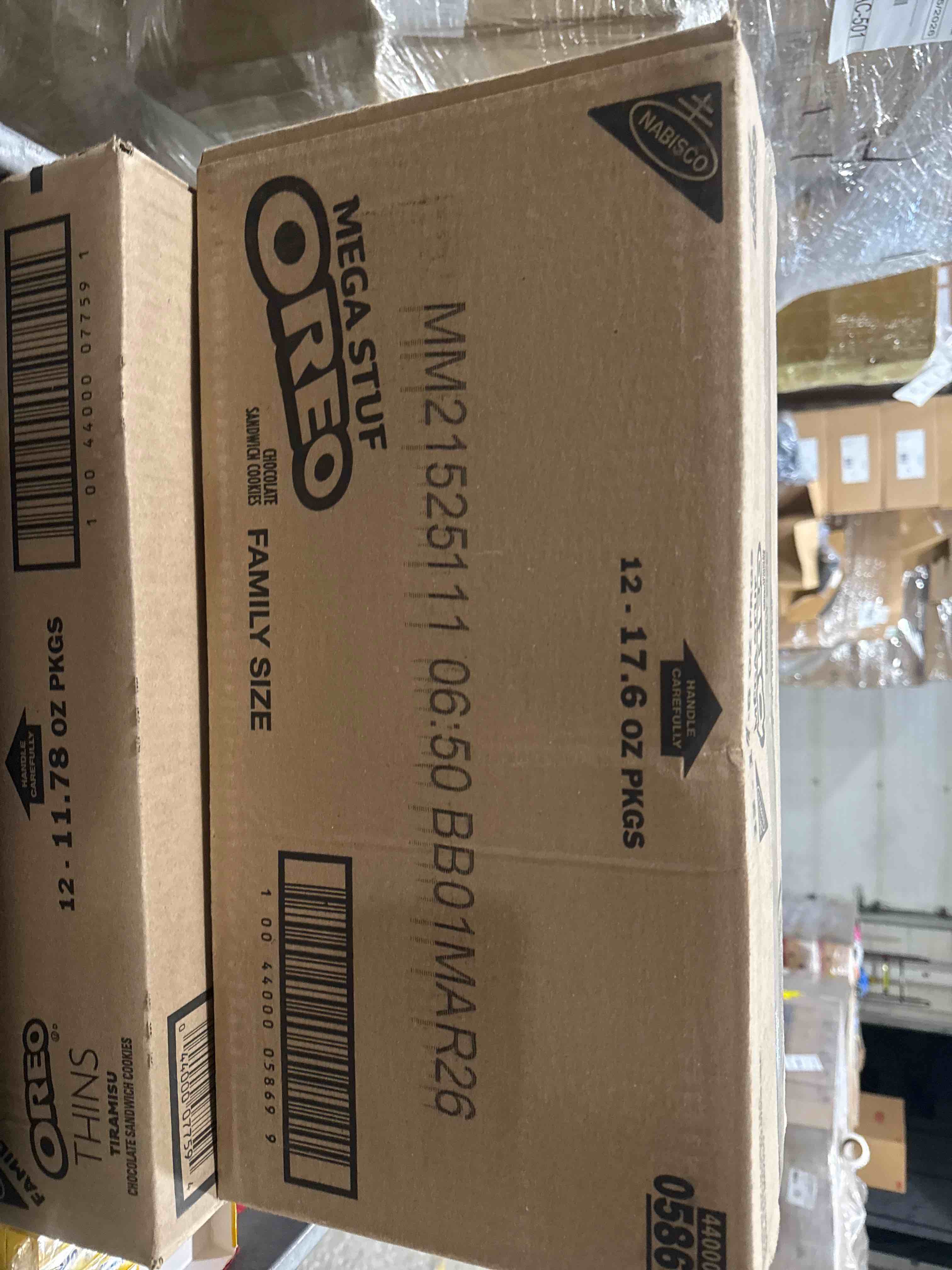Condition photo showing New/Like New for case of 12 mega stuf chocolate sandwich cookies, mega stuf bb march 2026