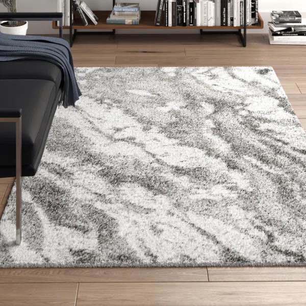 Khlani Benito Animal Print Gray Shag Area Rug