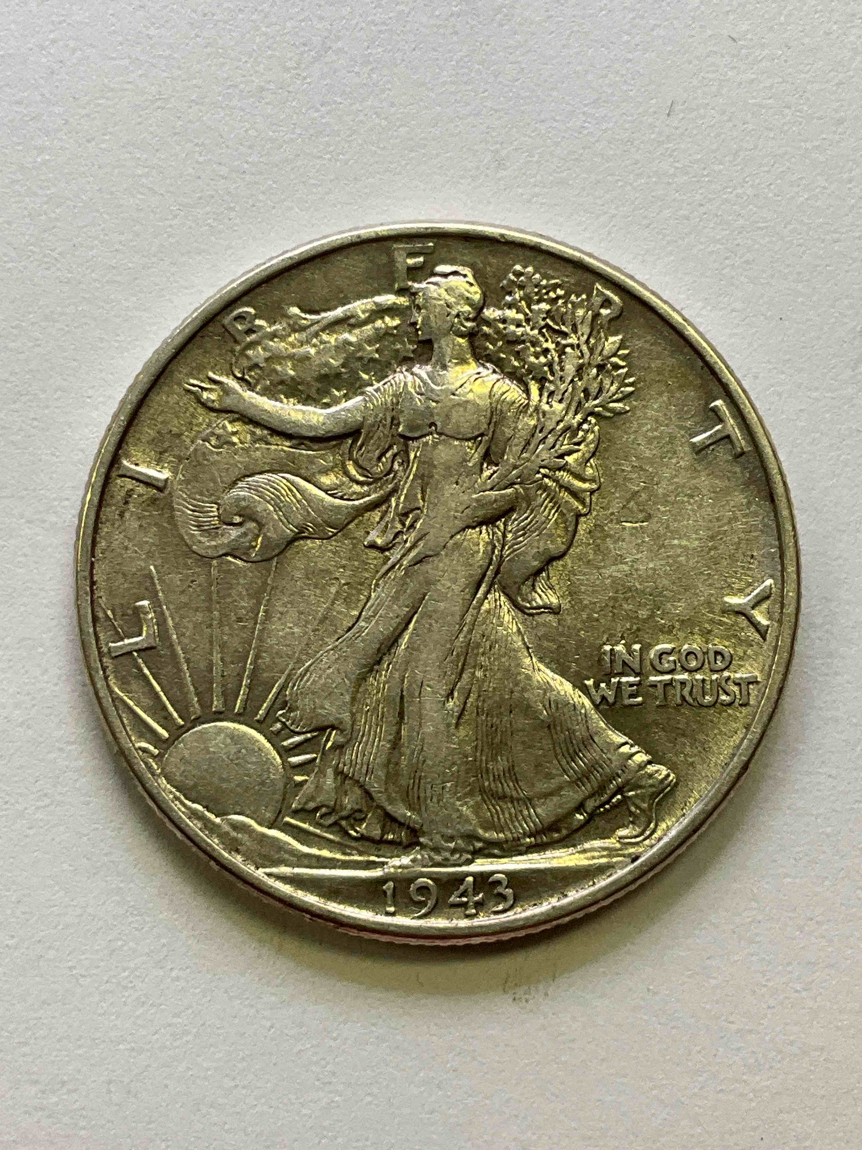 Appears Uncirculated World War II Era Silver! Antique U.S. Silver! Liberty Walking Silver Half Dollar! This Striking Half Dollars Were Minted From 1916-1947 & Have Become Some Of The Most Collectible Coins In History! Here Is A Striking Uncirculated Example From 1943, Liberty Walking Coins Are 90% Fine U.S. Silver, A Great Investment In Precious Metal!