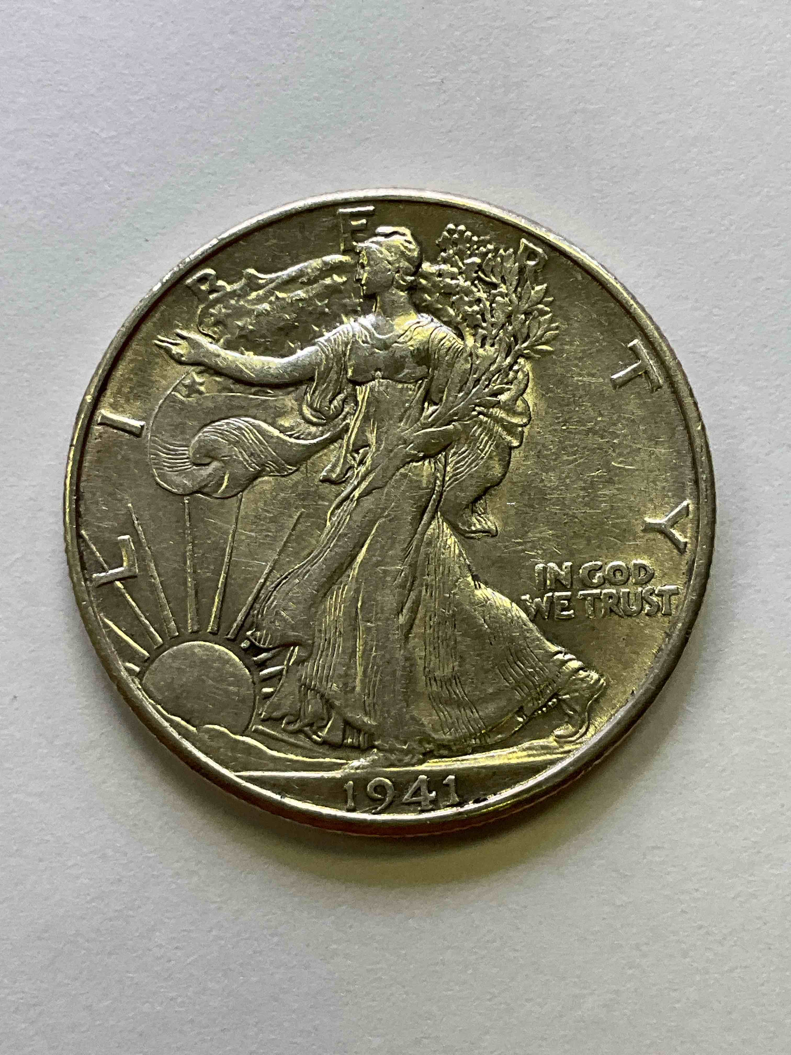 Appears Uncirculated World War II Era Silver! Antique U.S. Silver! Liberty Walking Silver Half Dollar! This Striking Half Dollars Were Minted From 1916-1947 & Have Become Some Of The Most Collectible Coins In History! Here Is A Striking Uncirculated Example From 1941, Liberty Walking Coins Are 90% Fine U.S. Silver, A Great Investment In Precious Metal!