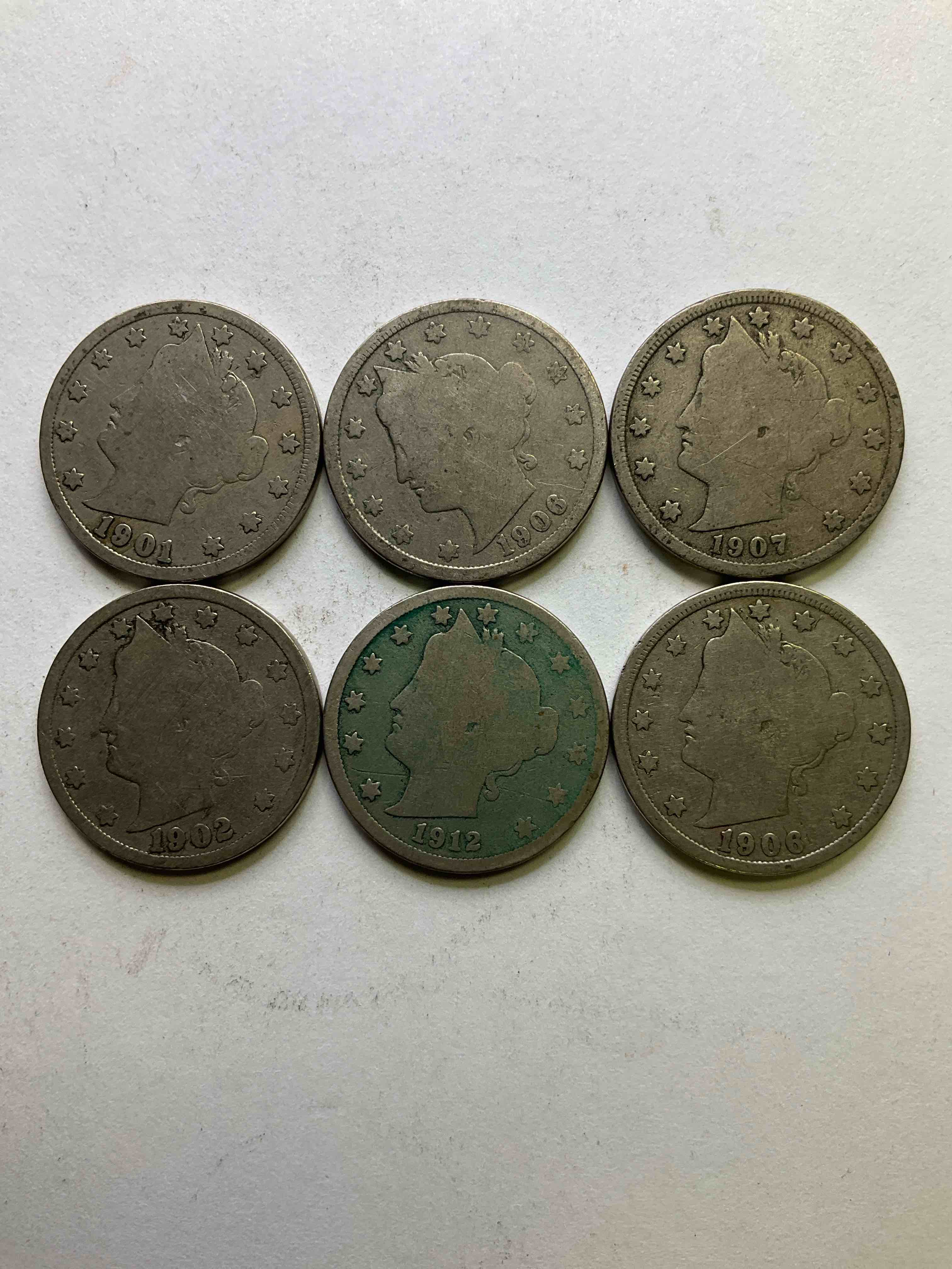antique u.s. "v" nickels, including 1912 version, year of the titanic! think of the history these coins have seen!, liberty head v nickels were minted up until 1913 & were the style of nickels before buffalo nickels. own some cool pieces of history! rare to see these coins with the "date on" in circulated condition!