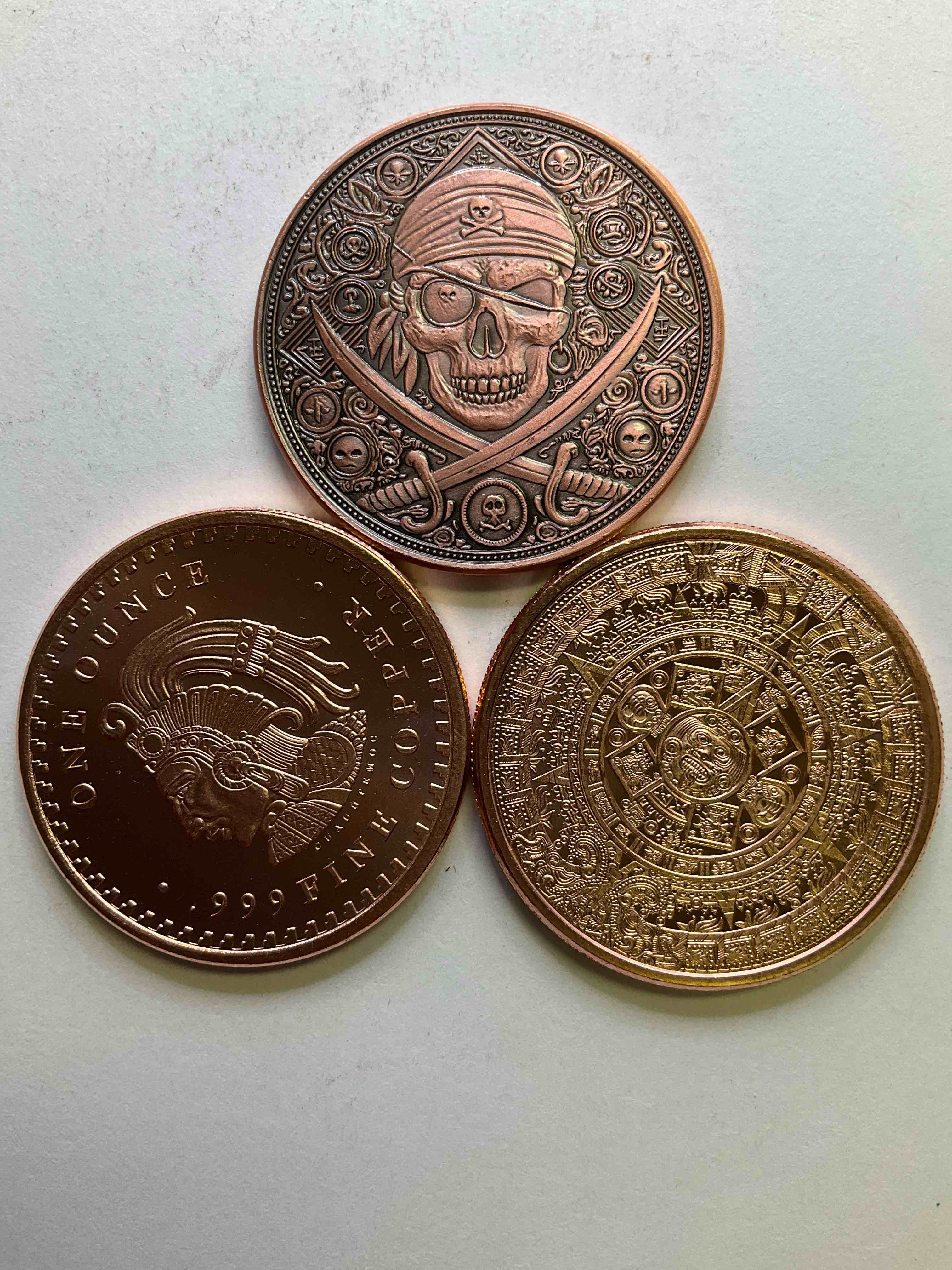 pure copper "pirate treasure!" check out these large, heavy 1.5" diameter pure copper coins in the style of pirate & aztec treasure! coins are stunning conversation pieces. makes for a great gift, & investment in fine u.s. copper!