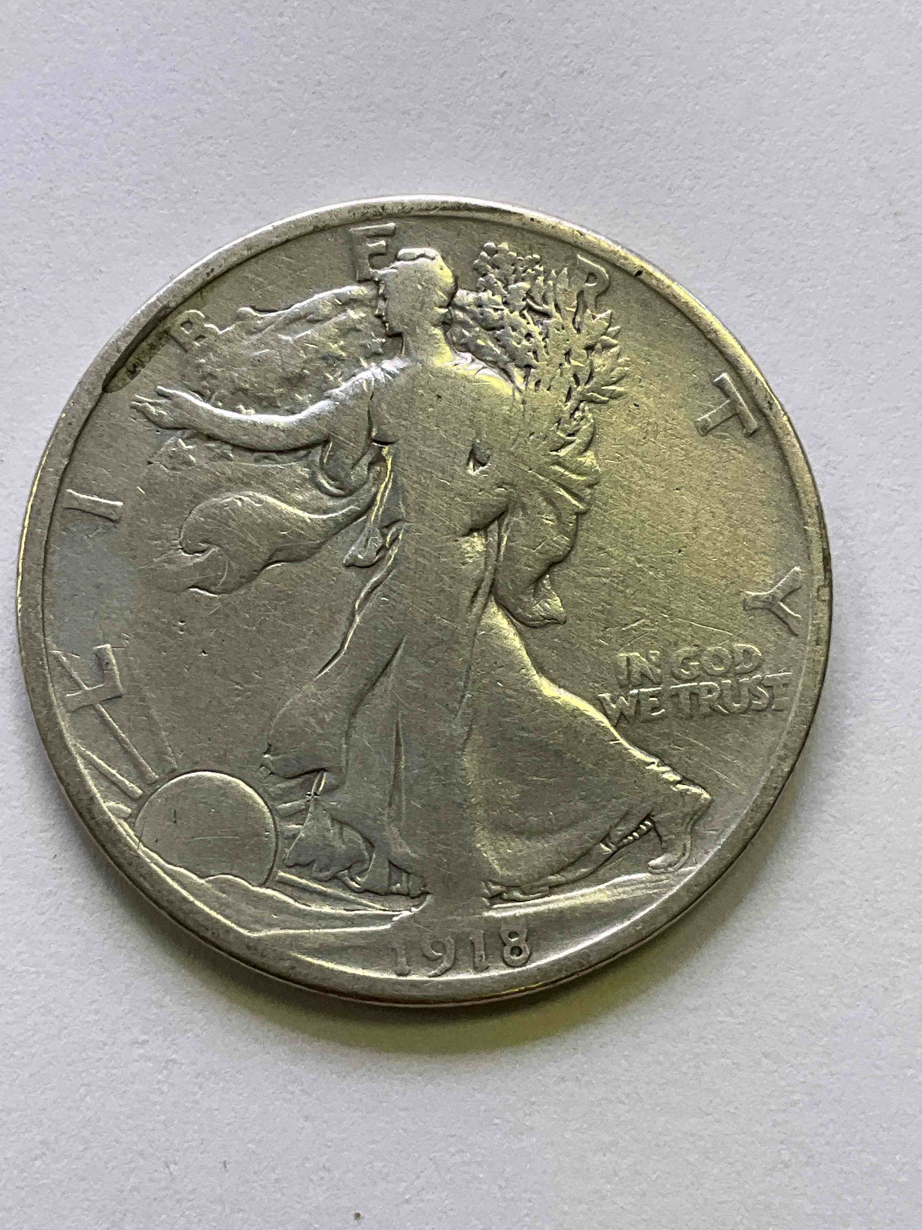 1918 World War One Silver! Armistice! WWI Ended Nov 11, 1918, A Day That Became Known As Armistice Day & Eventually Veterans Day! Up For Auction Is A 1918 U.S. "Liberty Walking" Half Dollar That Is 90% Fine U.S. Silver! Great For WWl Buffs & Folks Who Want To Invest In Fine U.S. Silver!