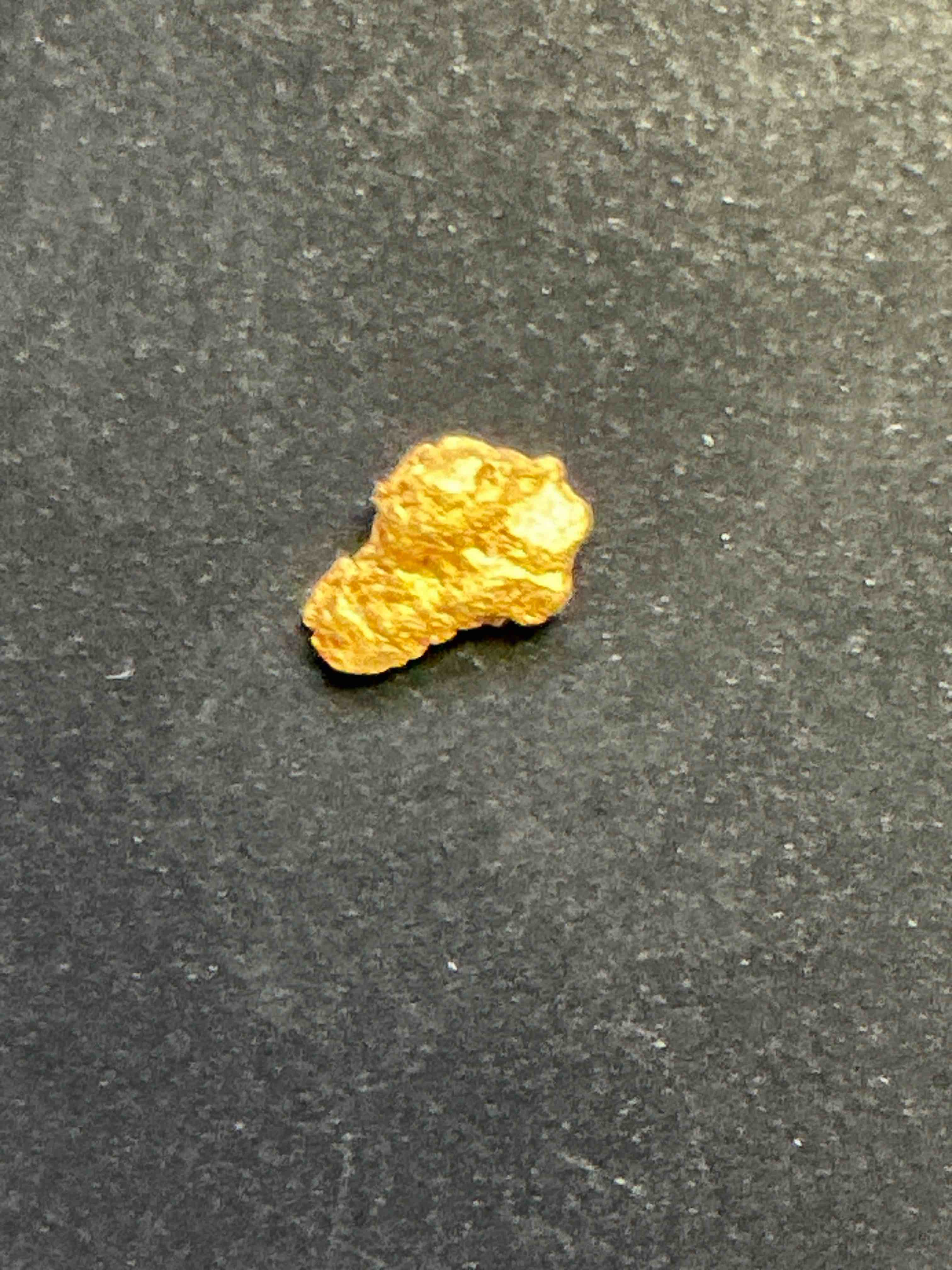 Gold Nugget, Authentic! Wow! This Is A Genuine Pure Gold Nugget Prospected From Fairplay, Colorado. Approximately 0.1 GM In Size/Weight. This Type Of Gold In Nugget Form That Has Not Been Processed Is Extremely Hard To Find & Is Much More Rare Than Processed Gold In Any Form. U.S. Dime Shown In Image Is For Visual Size Reference Only (Not Included). Own An Incredibly Cool Piece Of Gold & An Awesome Investment In Fine U.S. Gold Precious Metal! Every Gold Nugget Is "One Of A Kind!"