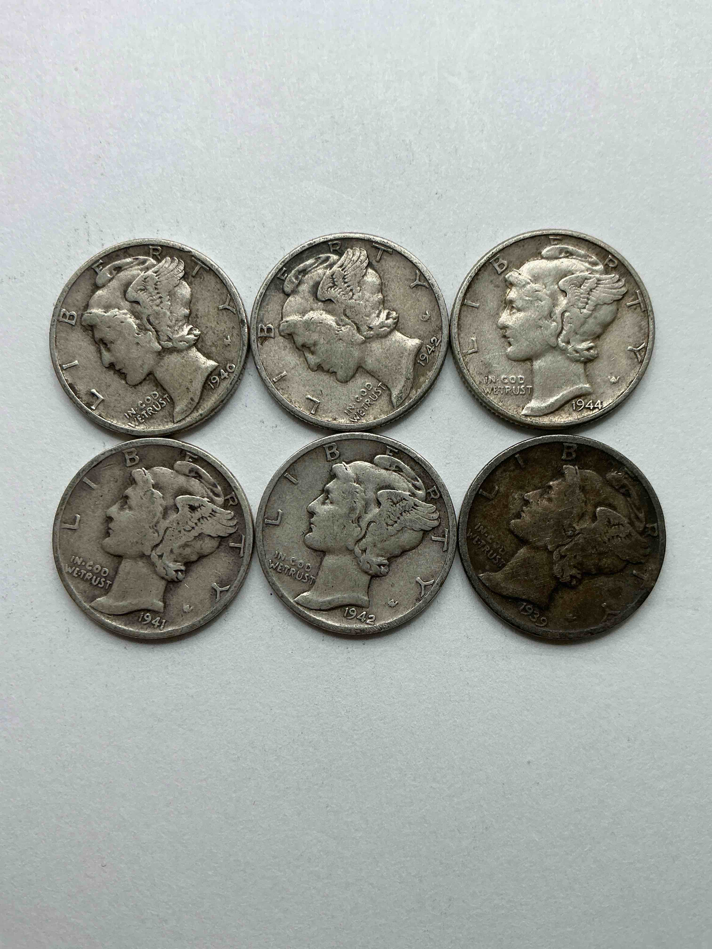 Antique U.S. Pure Fine Silver Mercury Dimes! Silver Mercury Dimes Were Minted From 1916-1945 & Have Become Serious Collector Items! Check Out These Awesome Examples, All In Nice, Circulated Condition With Visible Dates & Varying Years! Rare To Have Visible Dates! Makes For A Great Investment In Precious Metals, Mercury Dimes Are 90% Pure Fine Silver! They Don't Make Em' Like This Anymore!