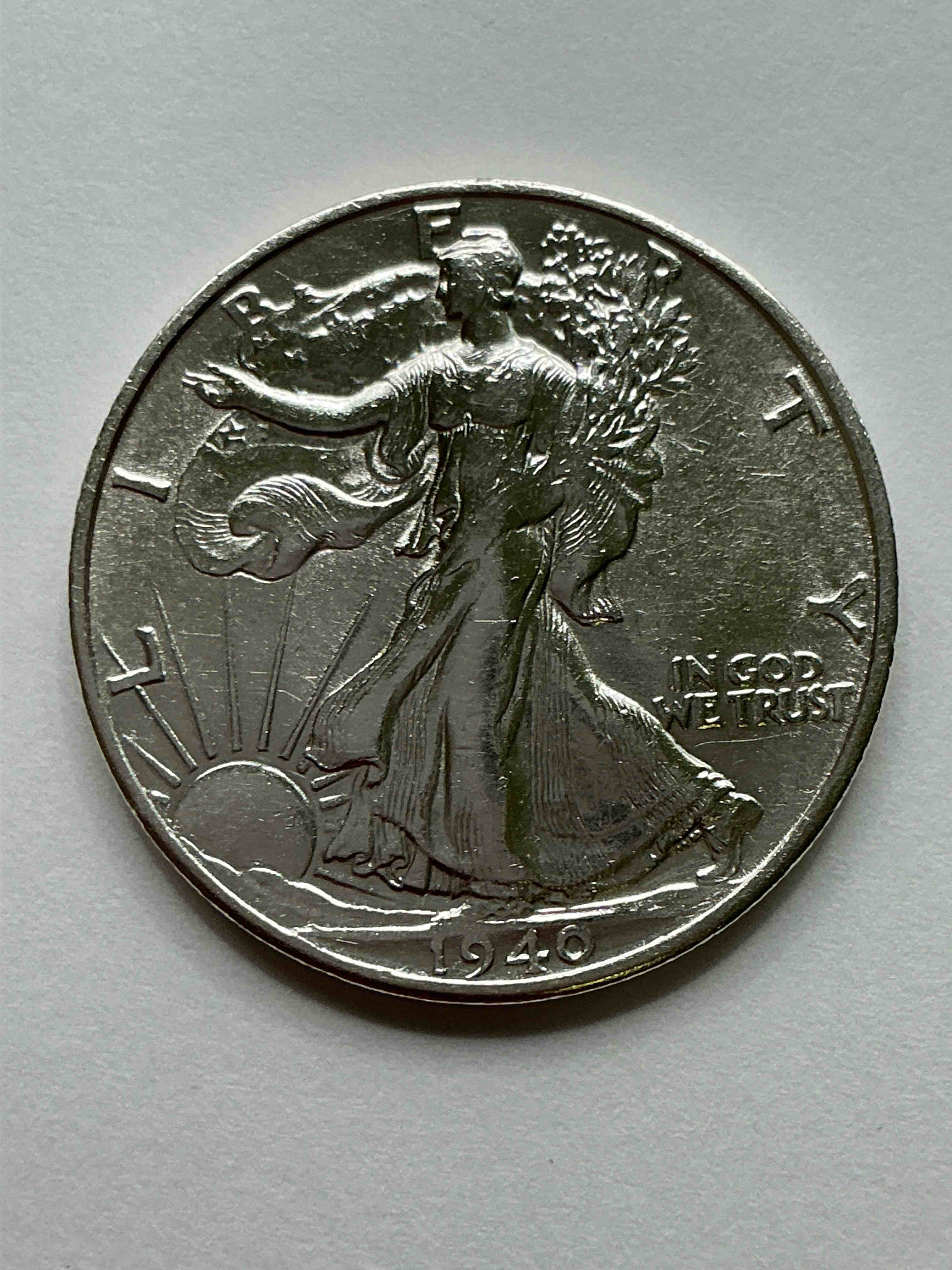 World War II Silver! Antique U.S. Silver! Liberty Walking Silver Fine U.S. Silver Half Dollar! This Striking Half Dollars Were Minted From 1916-1947 & Have Become Some Of The Most Collectible Coins In History! Here Is A Striking Circulated Example From 1940! Appears Uncirculated! Liberty Walking Coins Are 90% Fine U.S. Silver, A Great Investment In Precious Metal!